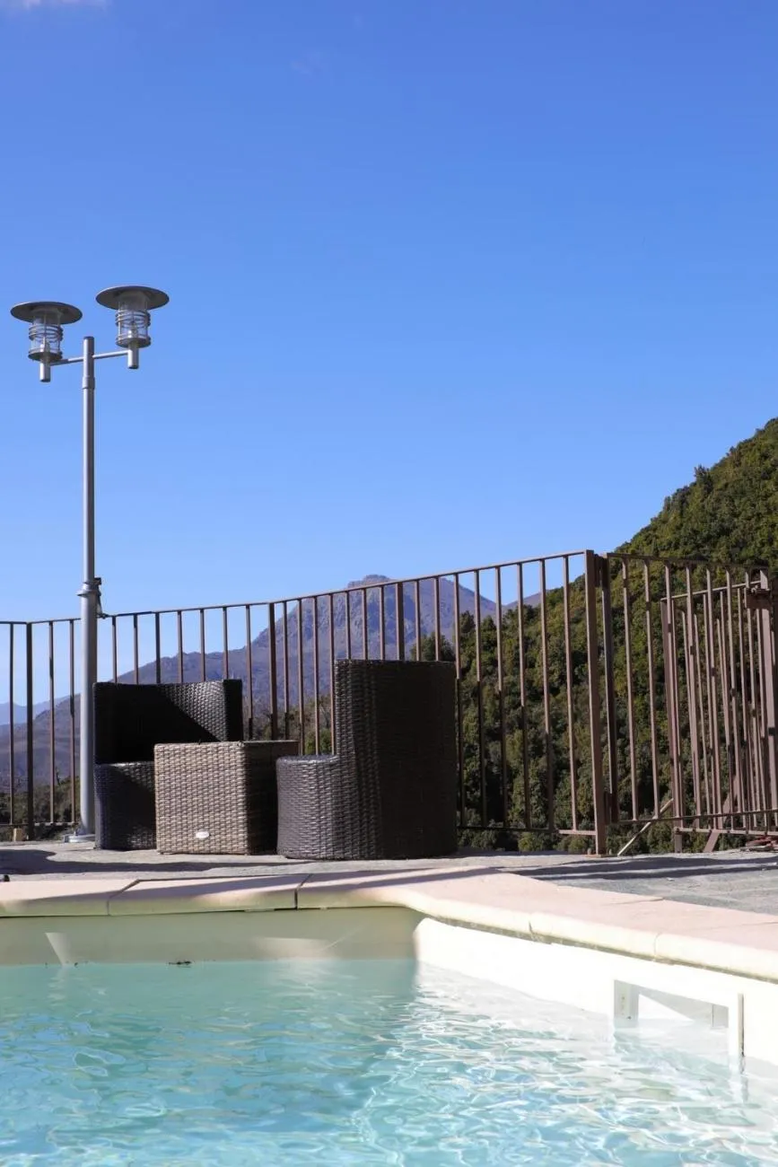 Swimming pool in Casa Di Lucia Mi-Hotel