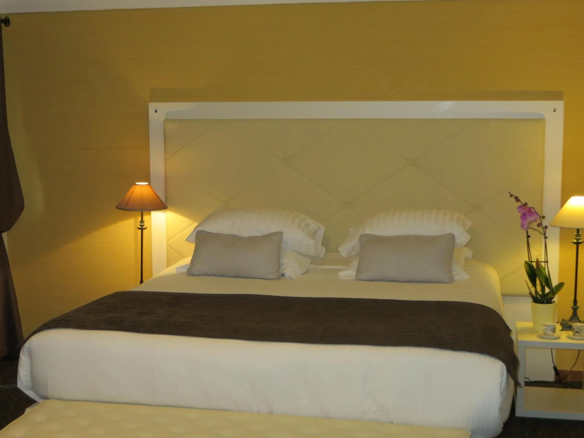 Bed in Casa Di Lucia Mi-Hotel