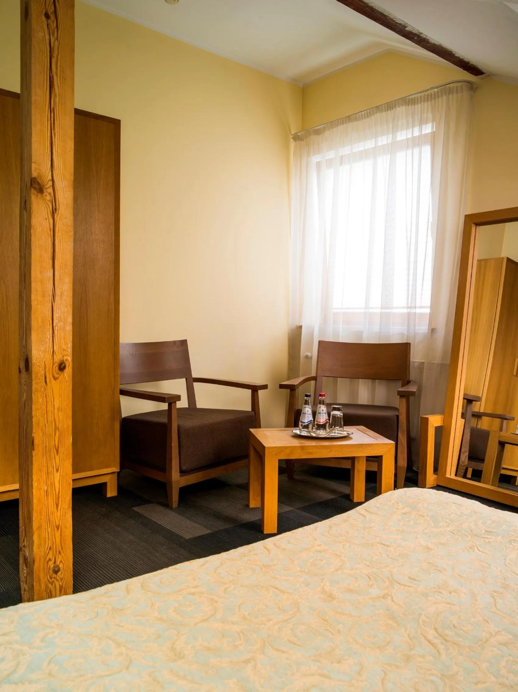 Seating area, Bed in Elizabete Design Hotel