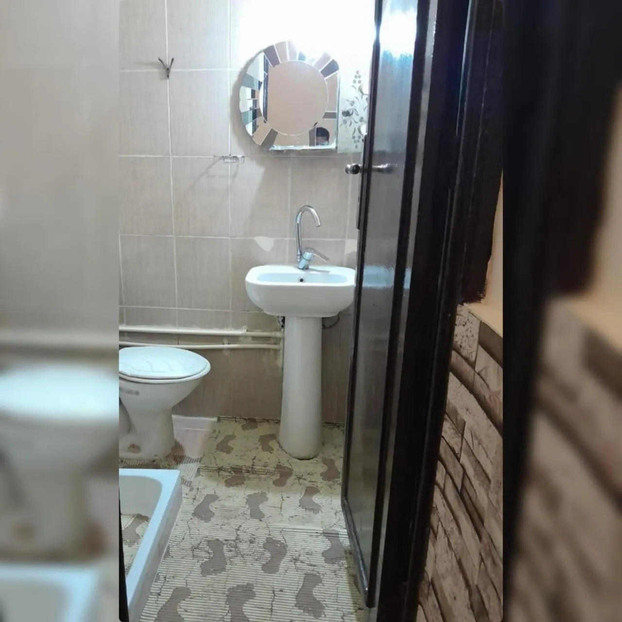 Toilet in New Palace Hotel