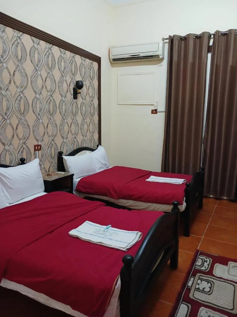 Bed in New Palace Hotel