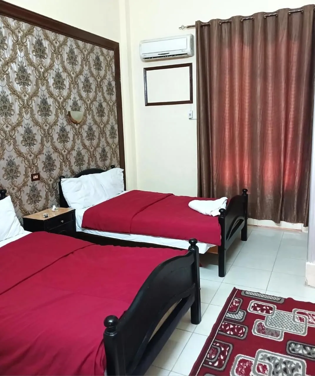 Bed in New Palace Hotel