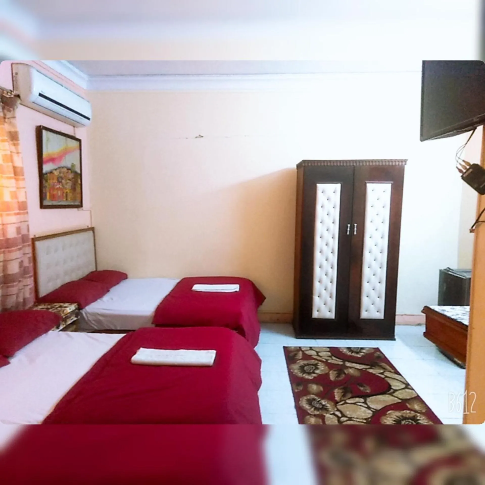 Bed in New Palace Hotel