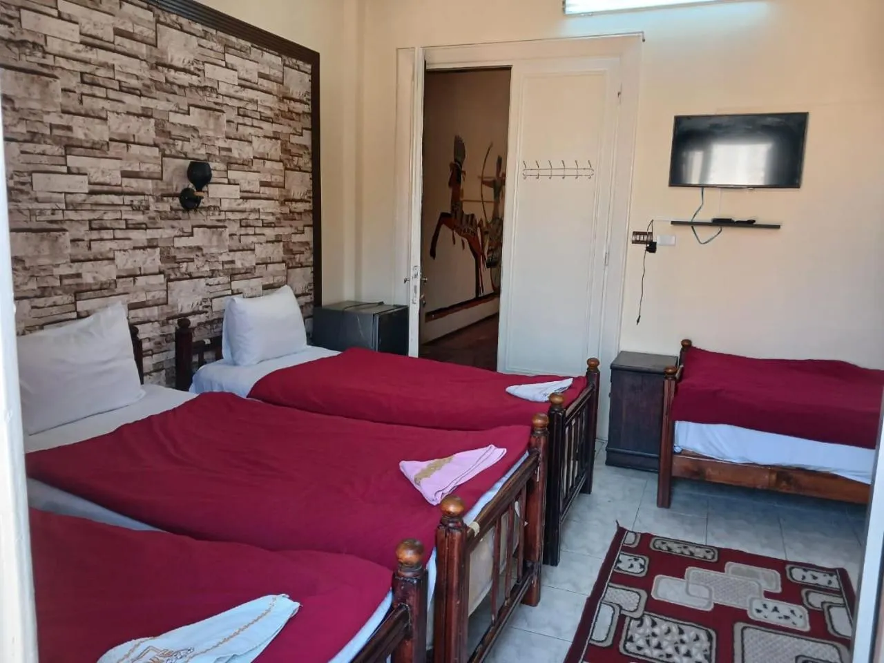 Bed in New Palace Hotel