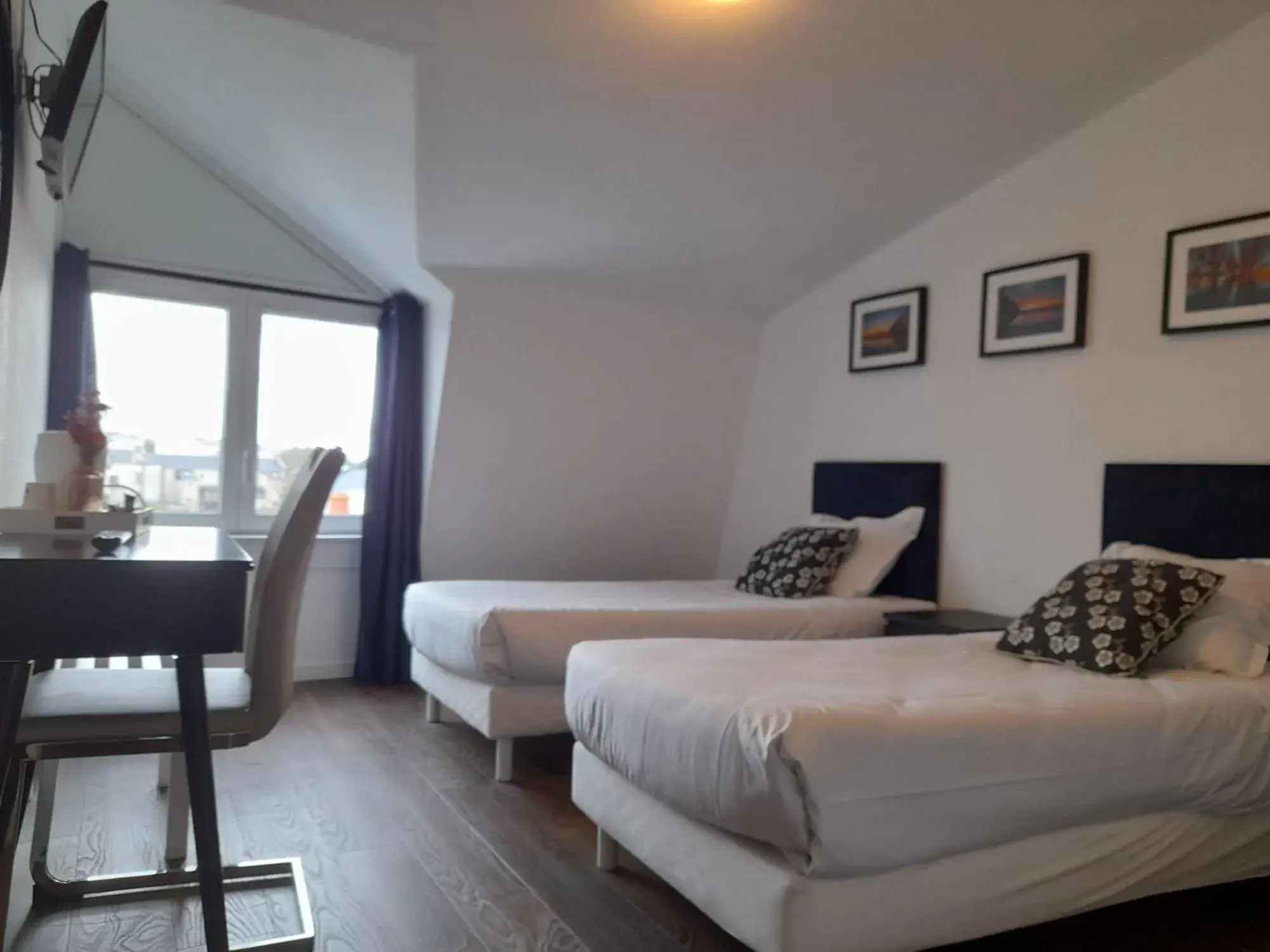 Twin Room in Hôtel Le Vauban Twin Room in Hôtel Le Vauban