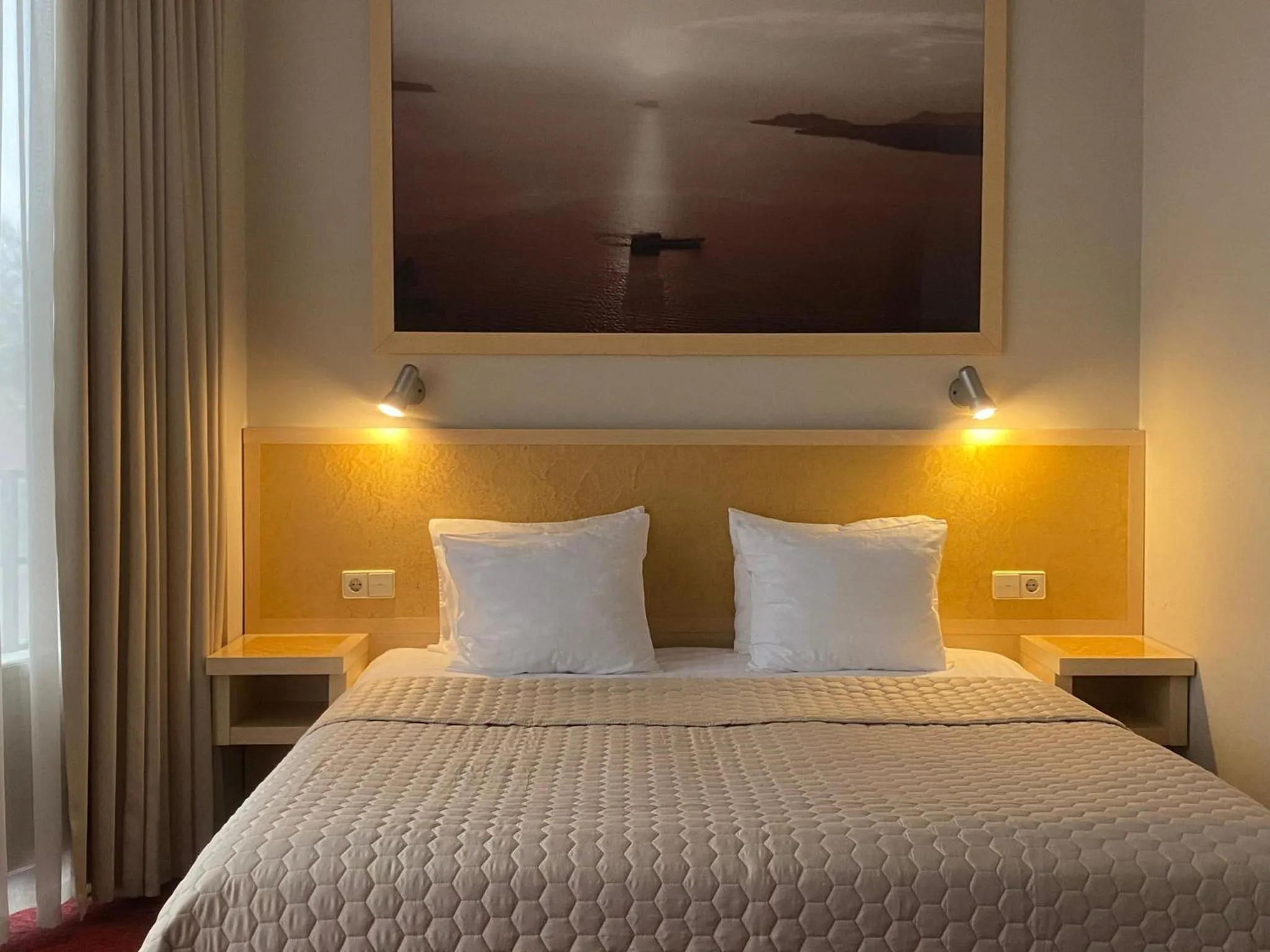 Bed in Hotel Kolumbs