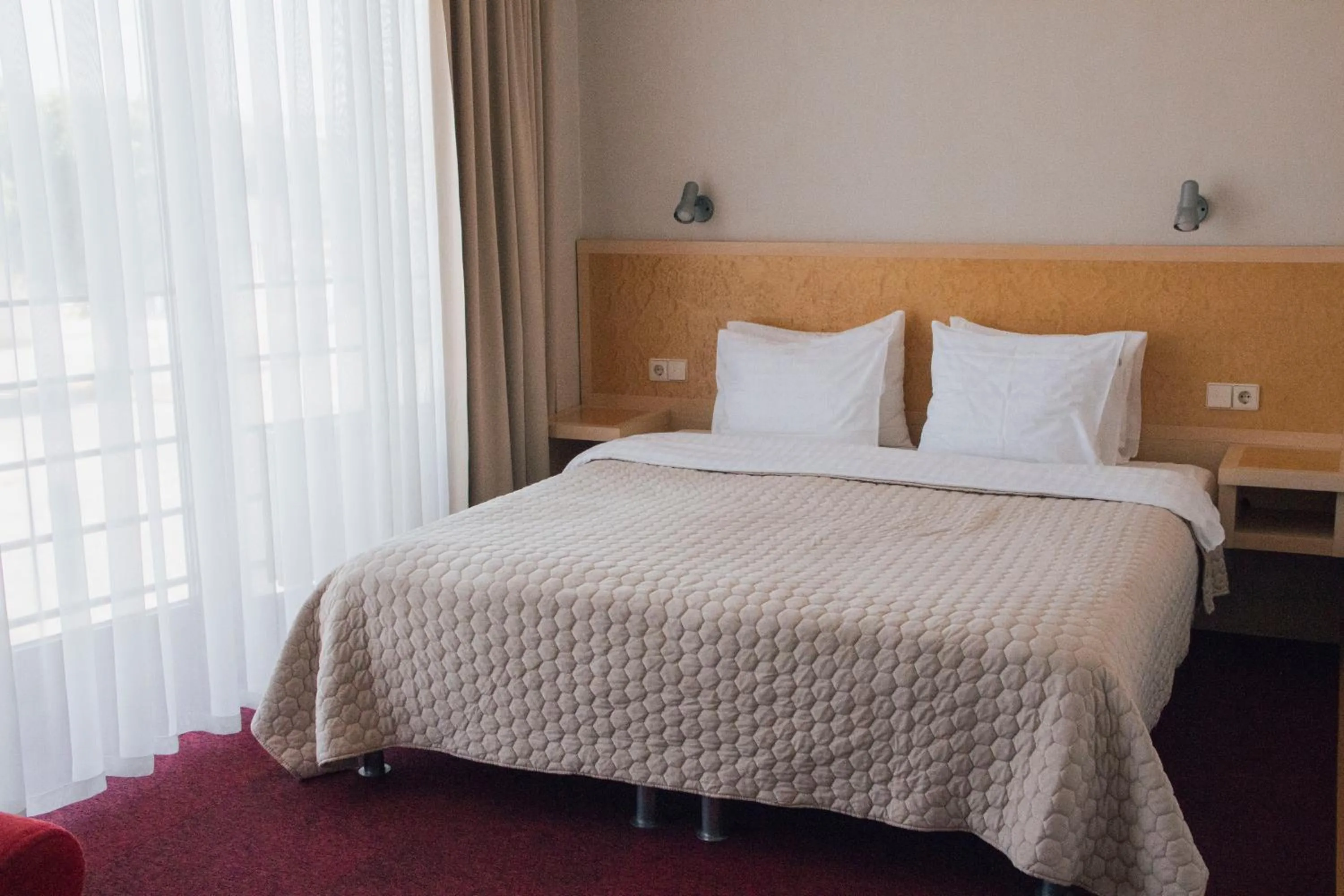 Bed in Hotel Kolumbs