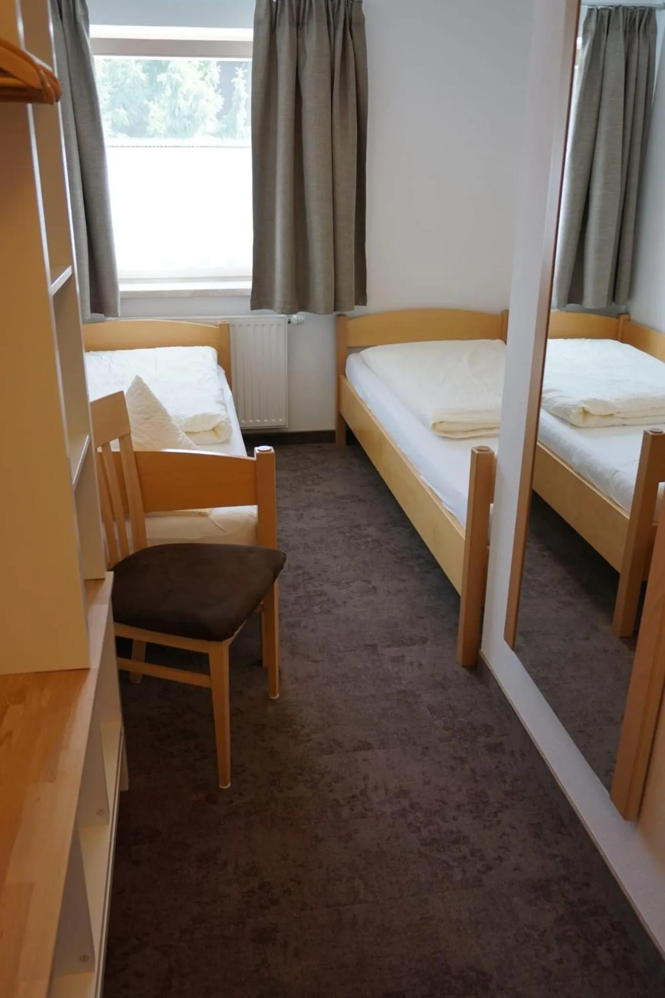 Photo of the whole room, Bed in Appartements Bergsonne