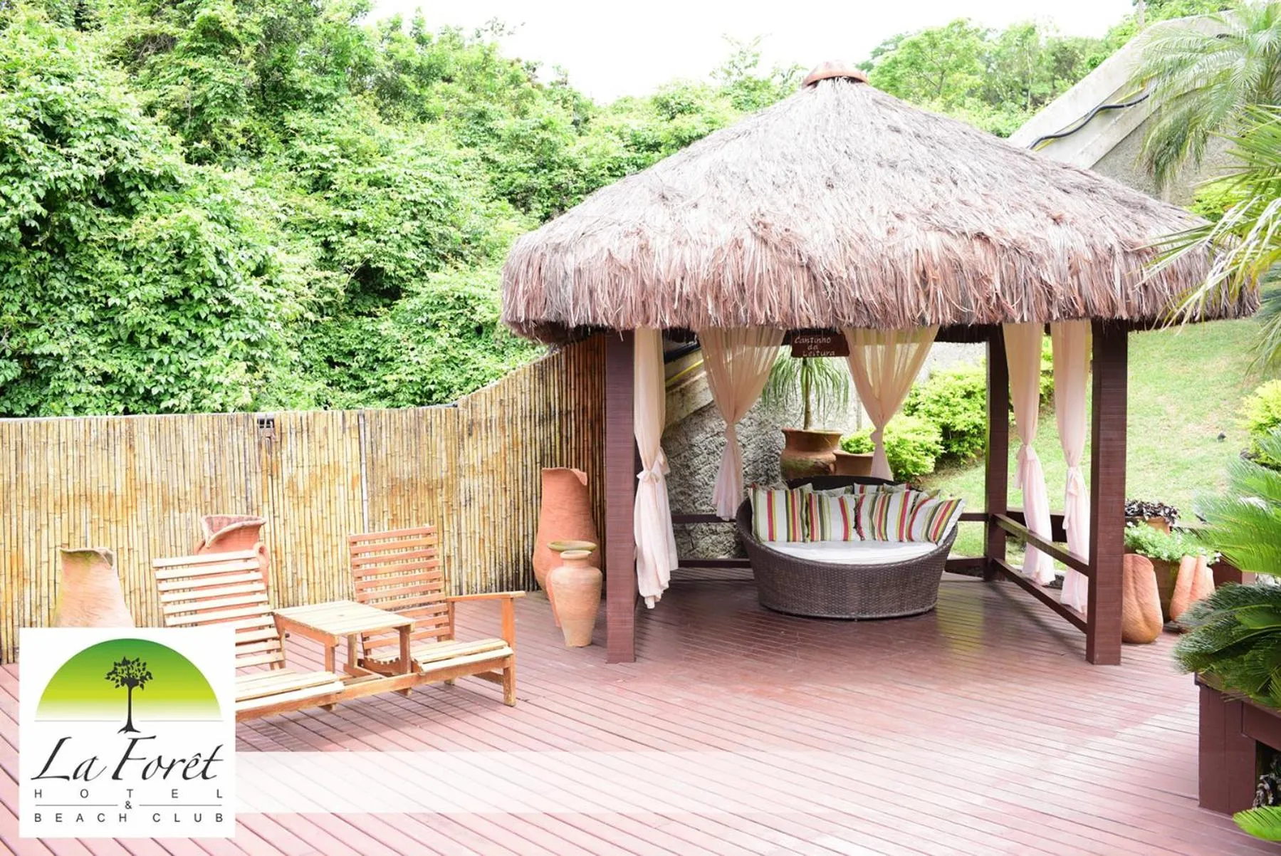 Communal lounge/ TV room in Hotel La Forêt & Beach Lounge