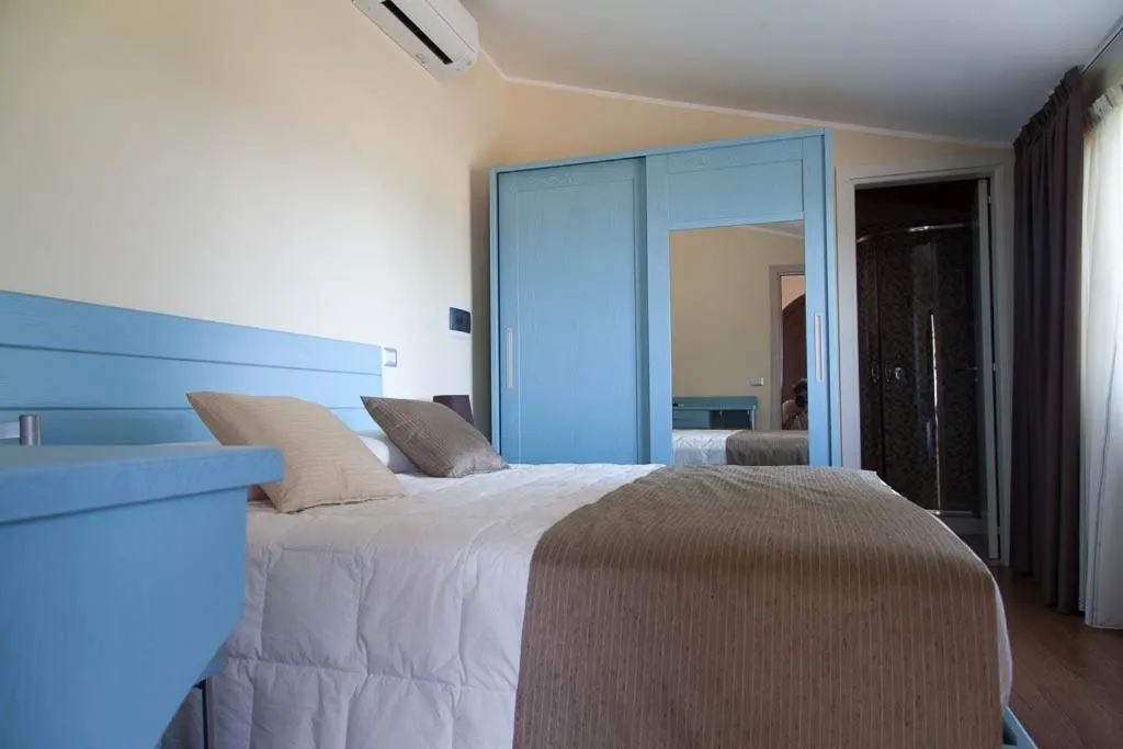 Bed in B&B Le Rose del Tirreno