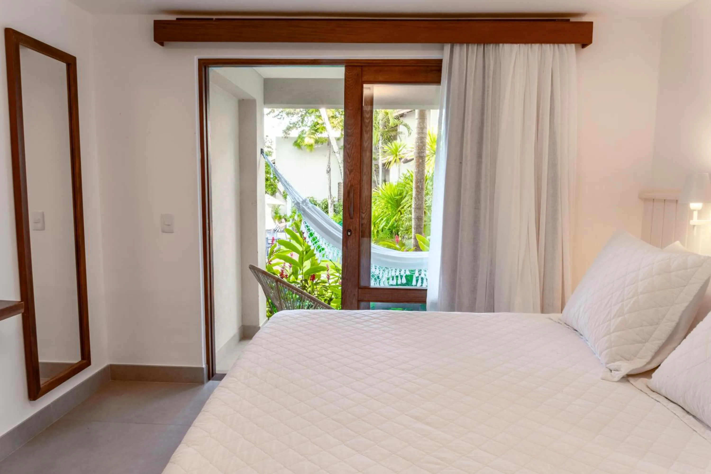 Bed in Hotel Paraiso do Morro