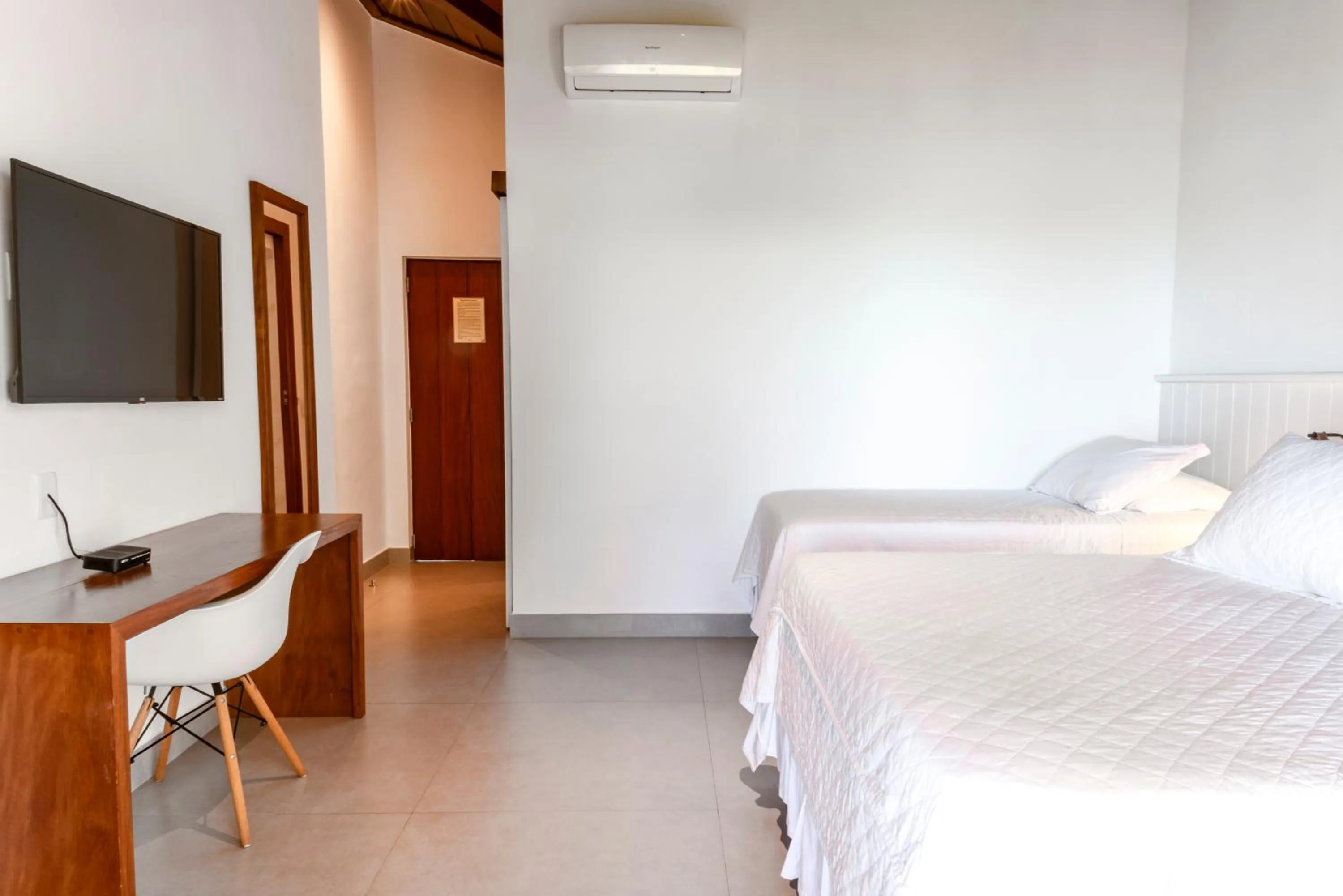 Bed in Hotel Paraiso do Morro