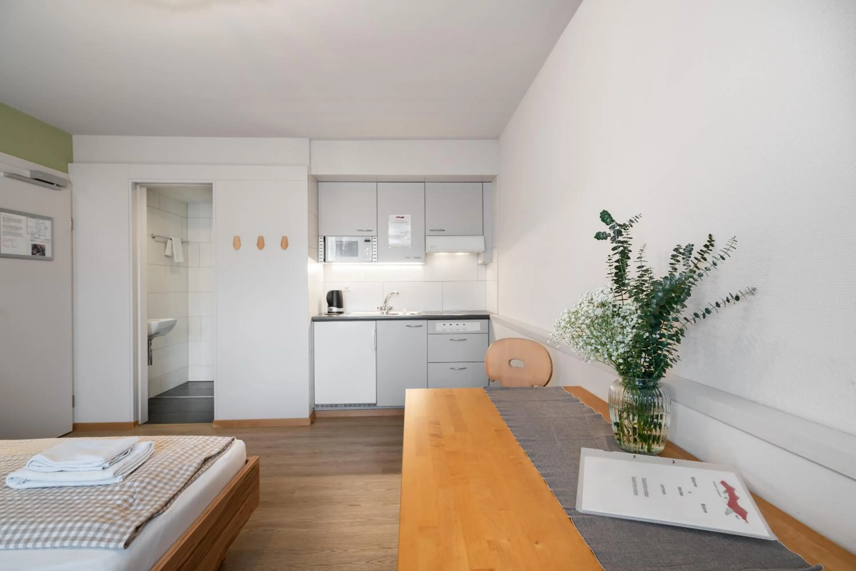 Photo of the whole room in Interlaken Apartments