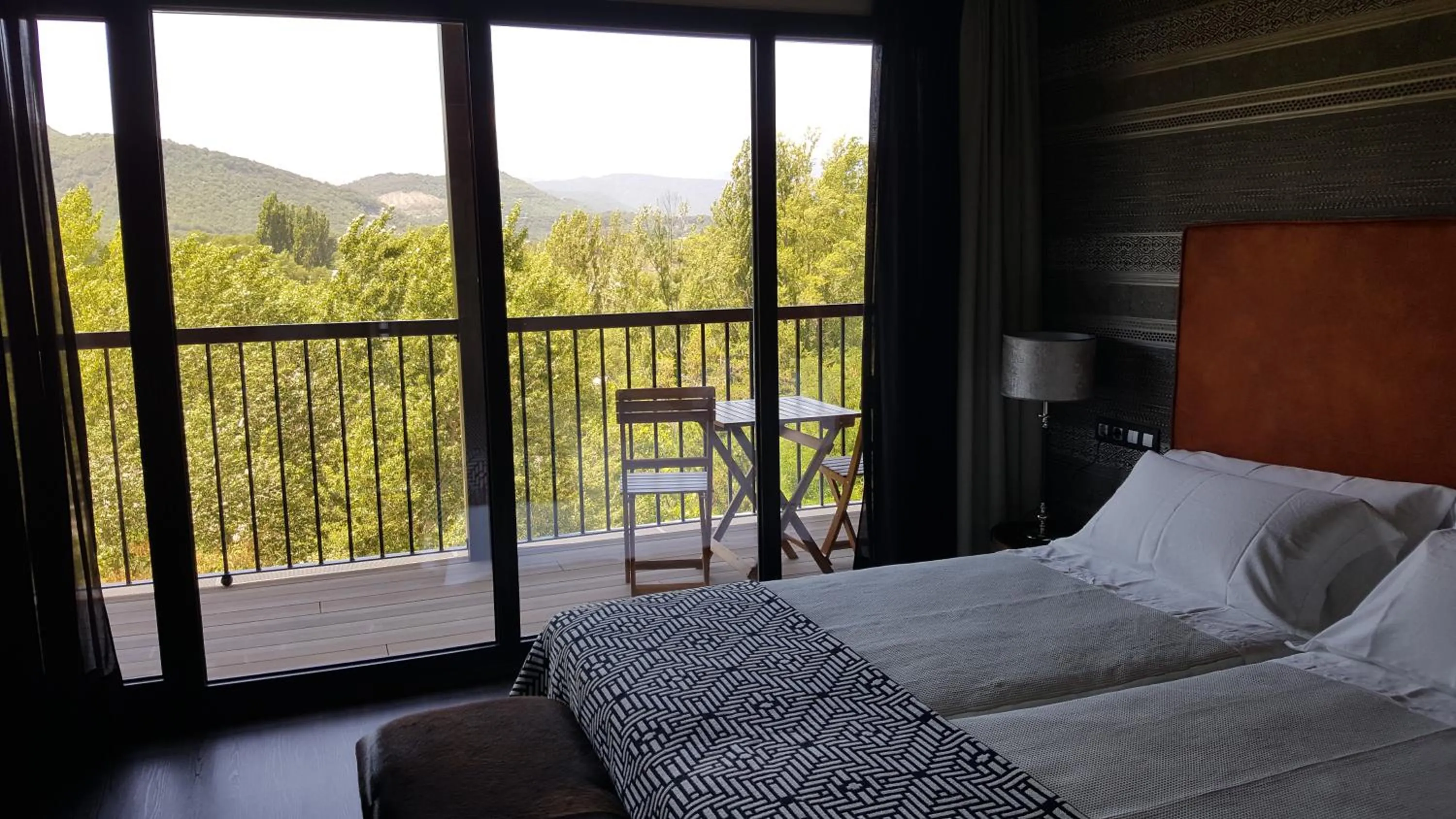 Bed in Alojamientos Ainsa Sanchez