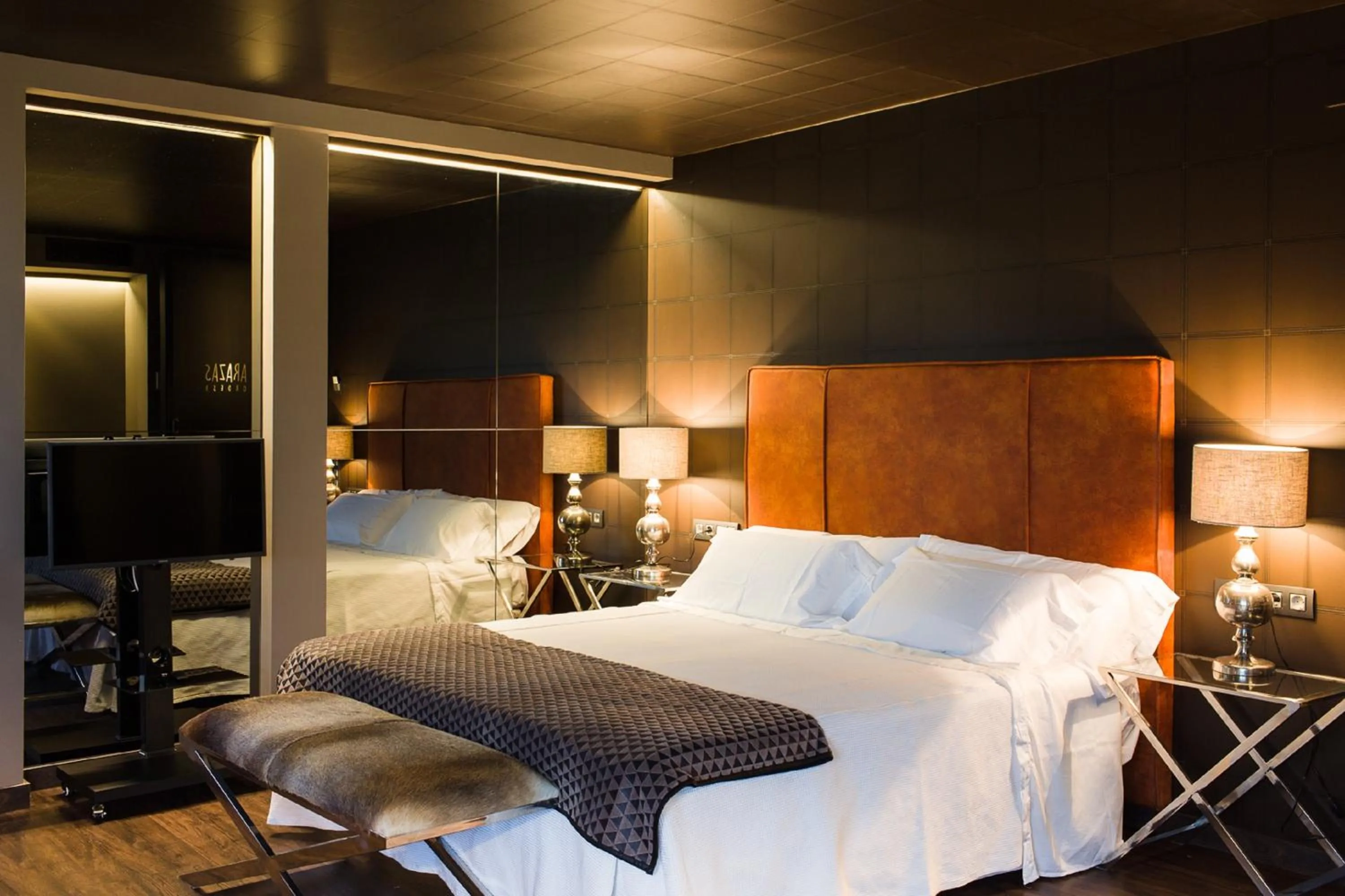 Bed in Alojamientos Ainsa Sanchez