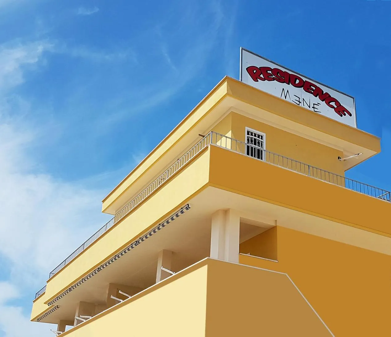 Property building in Residence Menè