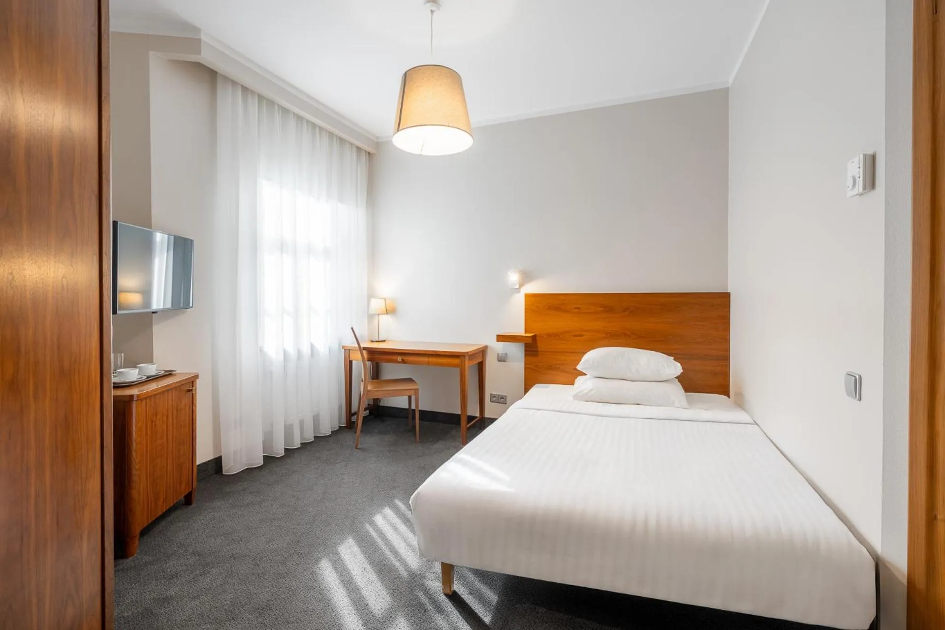 Photo of the whole room, Bed in RIJA Riga City Centre Hotel