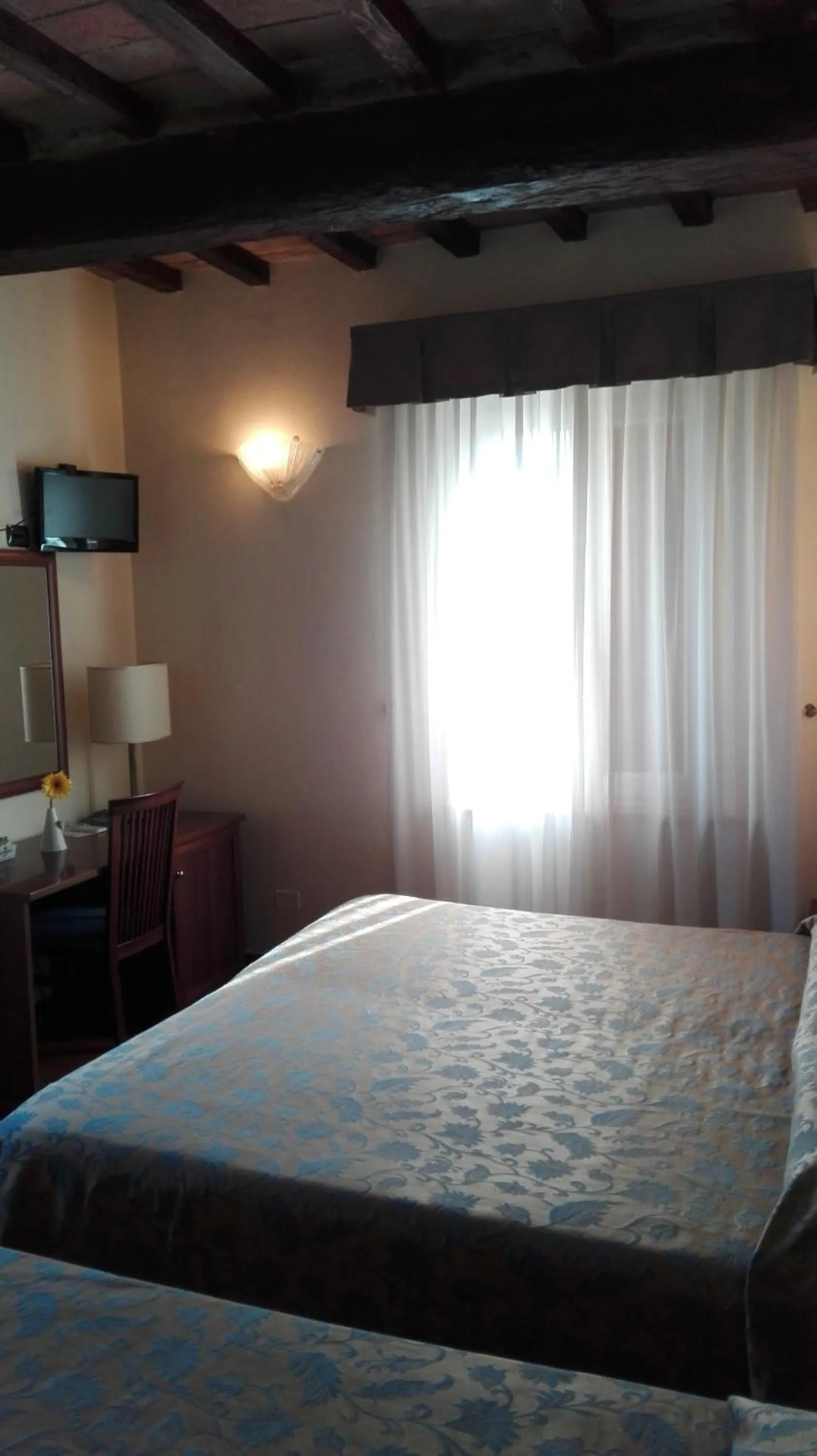 Photo of the whole room, Bed in Corte Degli Estensi