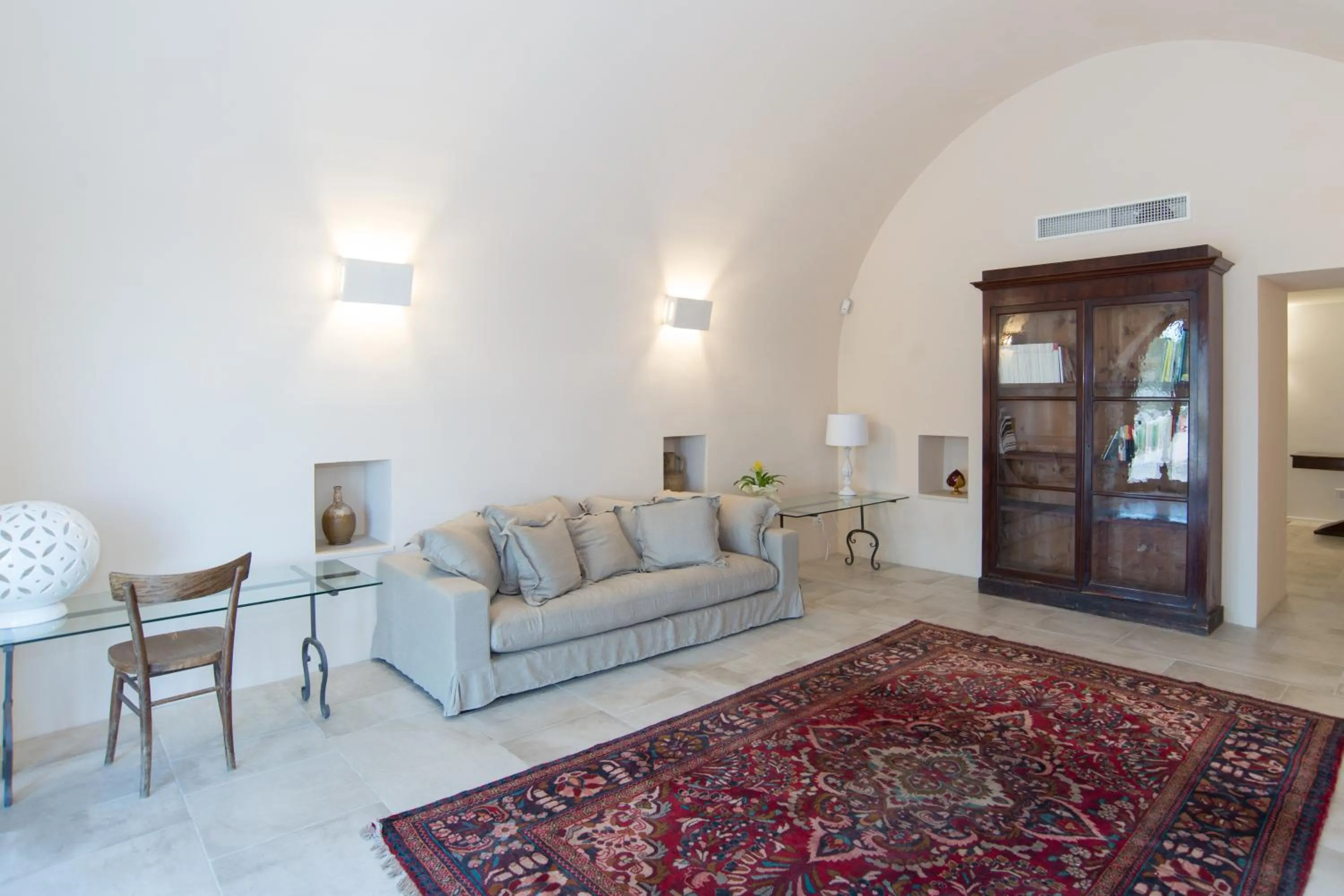 Communal lounge/ TV room in Masseria Fontana di Vite