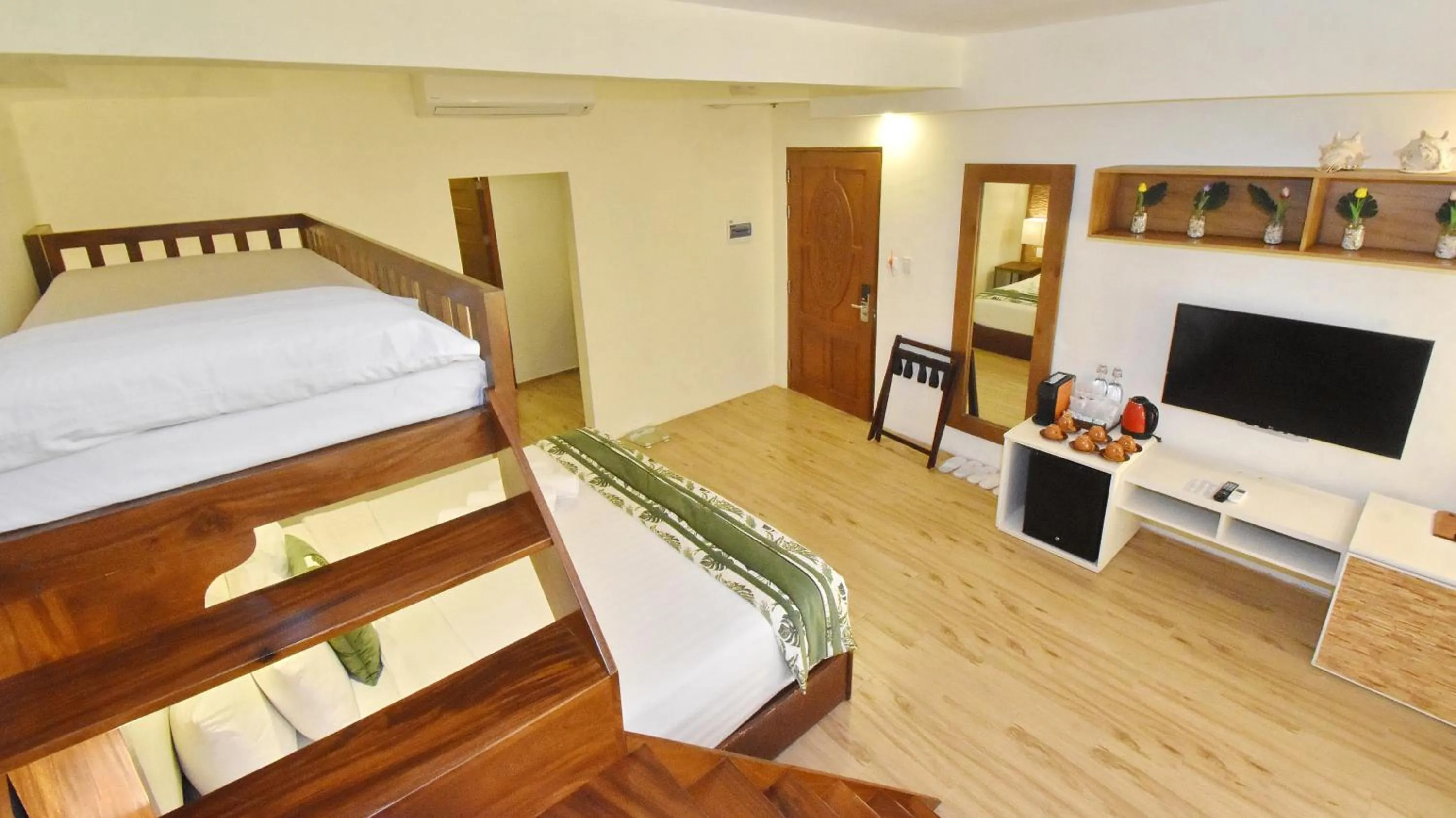 Bed in Ambassador In Paradise