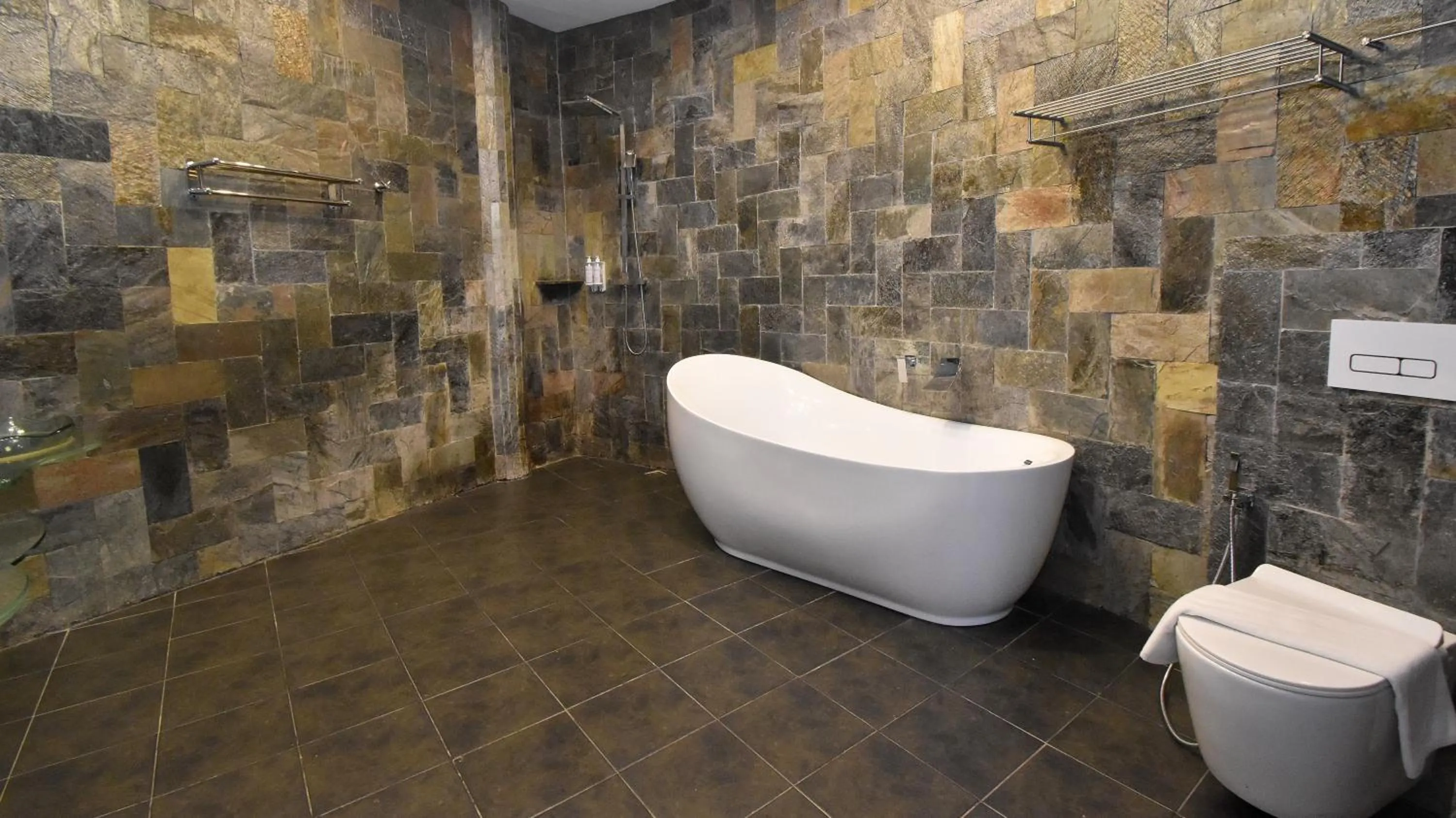 Toilet in Ambassador In Paradise