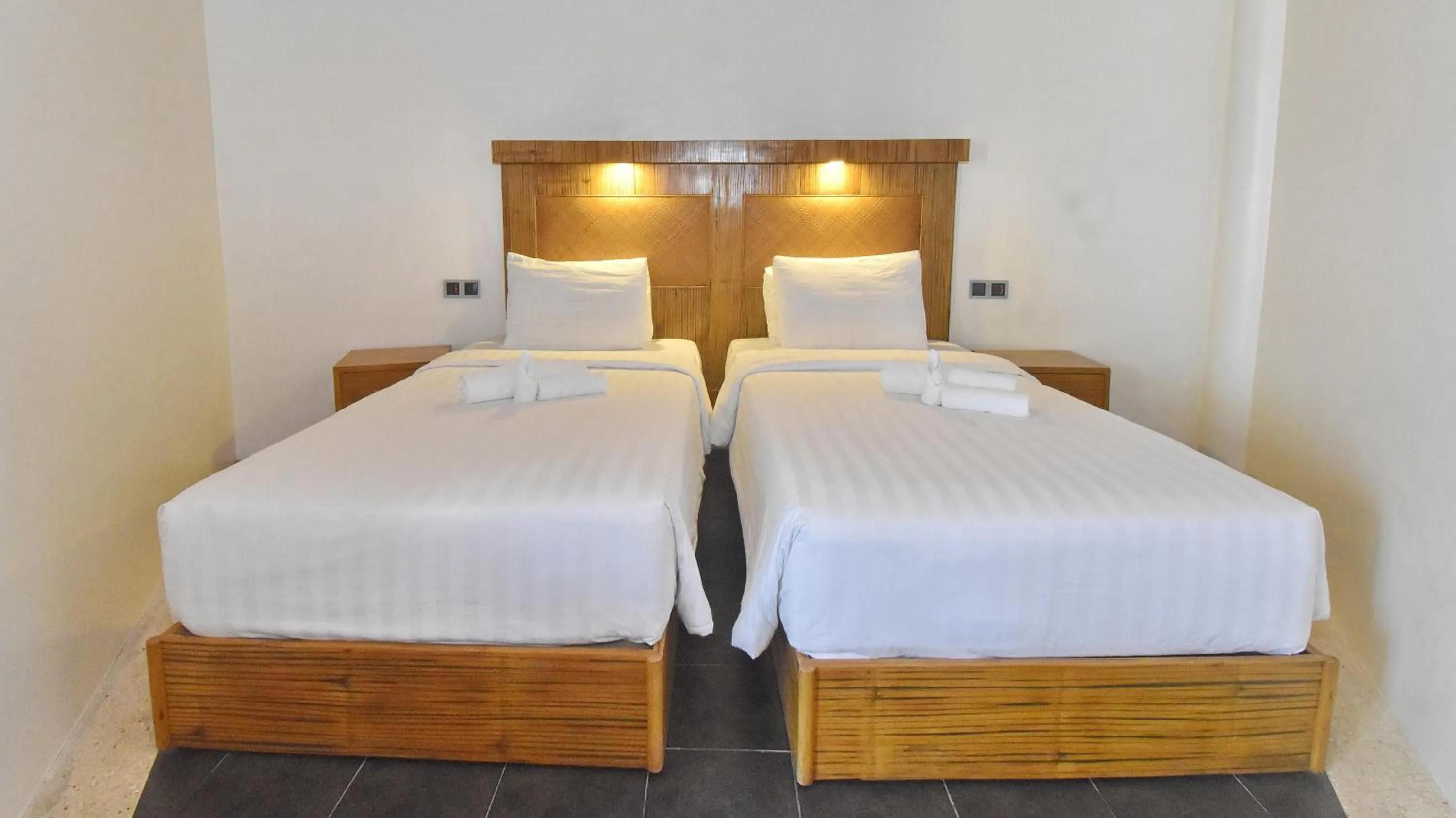 Bed in Ambassador In Paradise