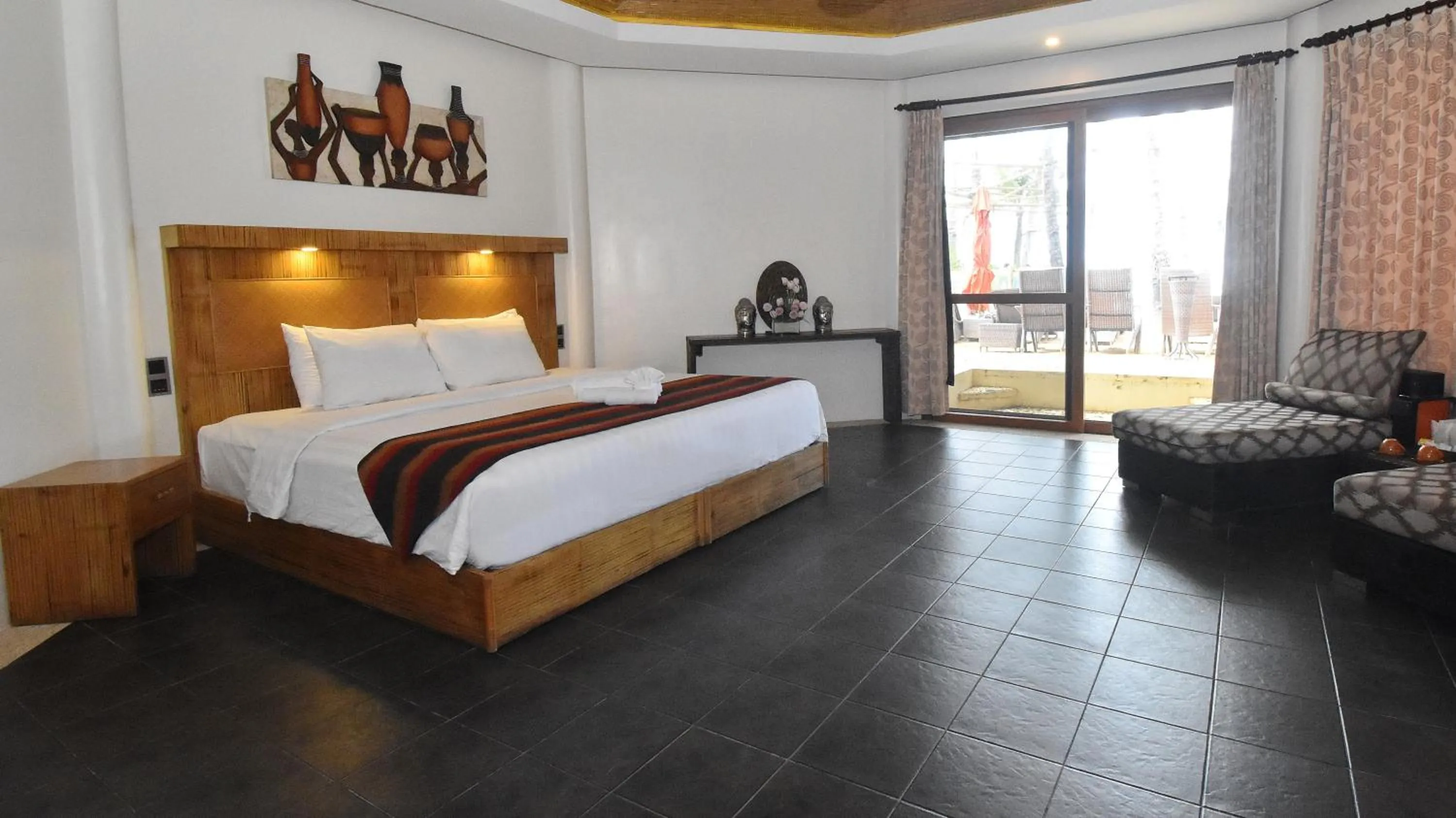 Bed in Ambassador In Paradise