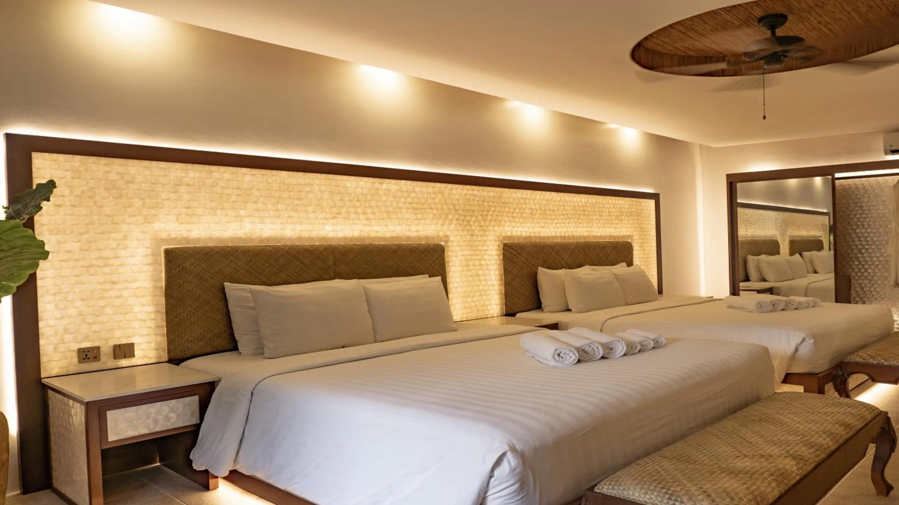 Bed in Ambassador In Paradise