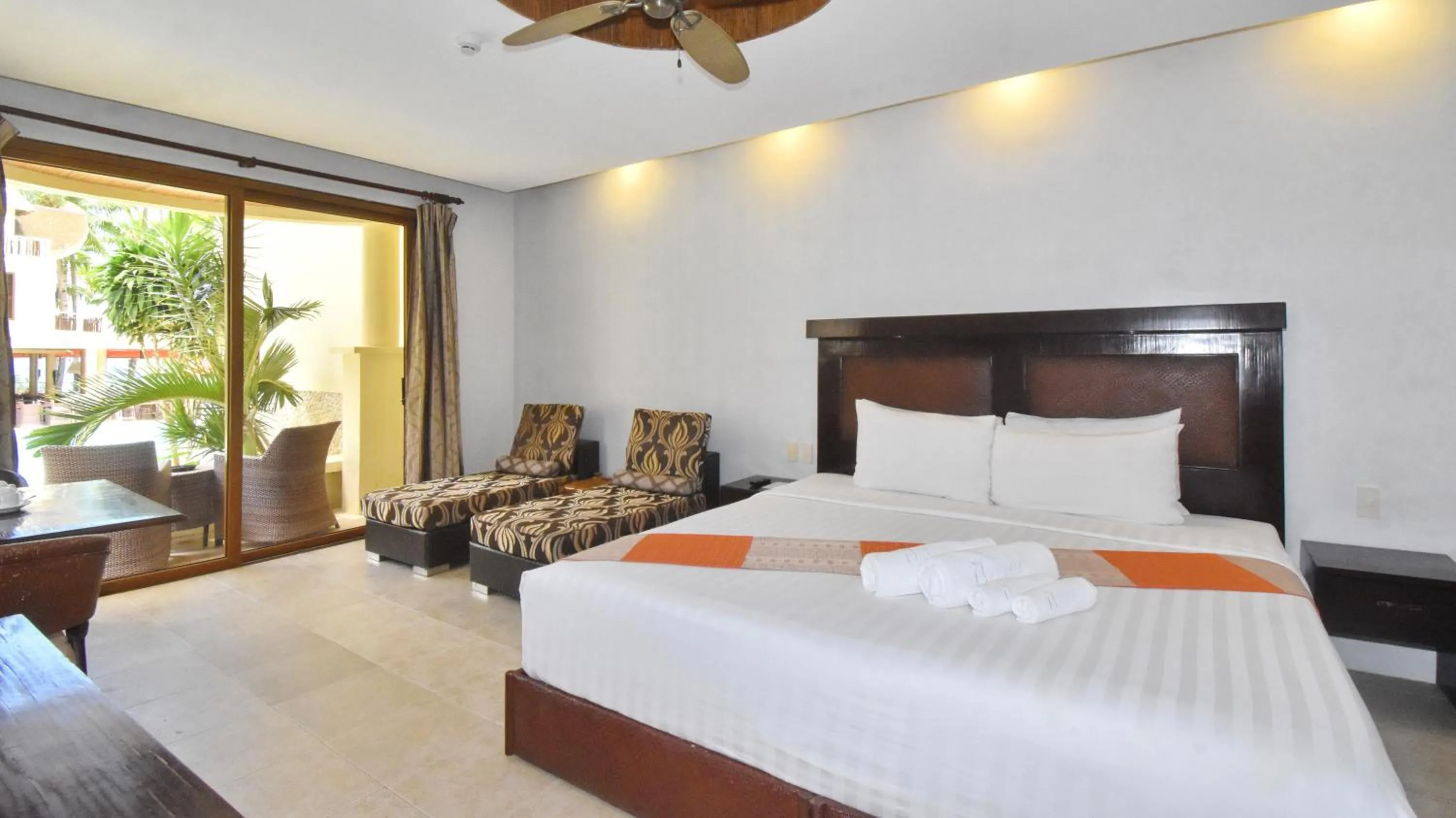 Bed in Ambassador In Paradise