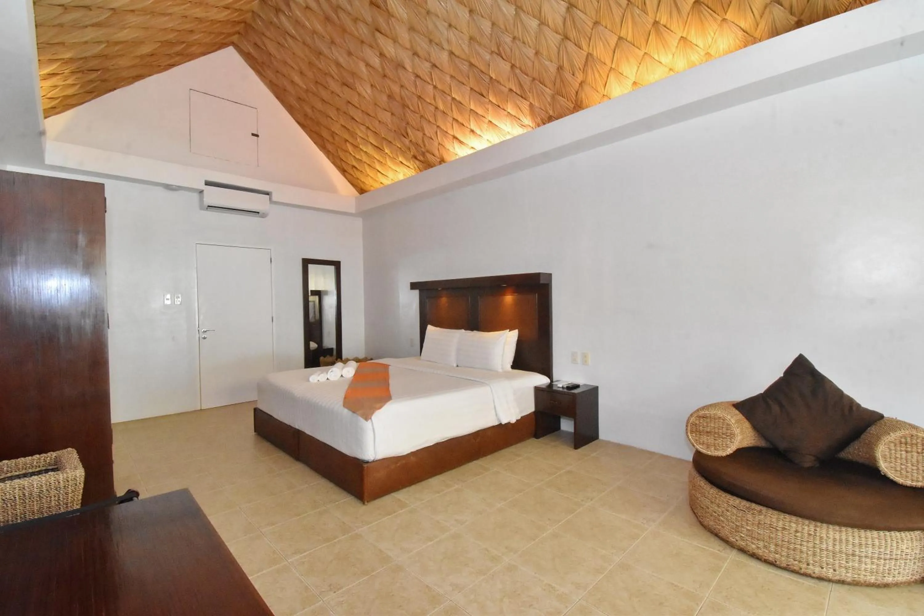 Bed in Ambassador In Paradise