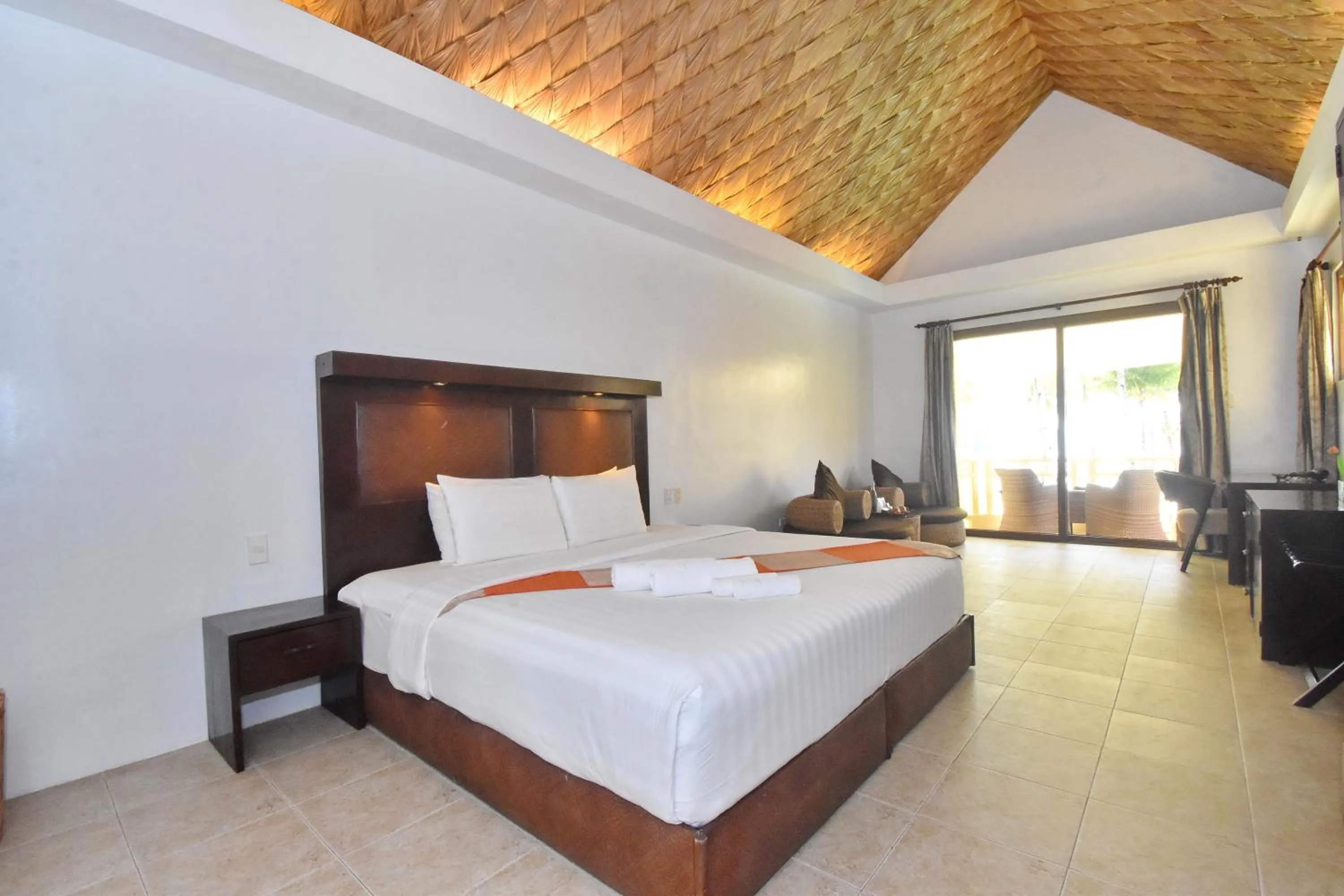 Bed in Ambassador In Paradise