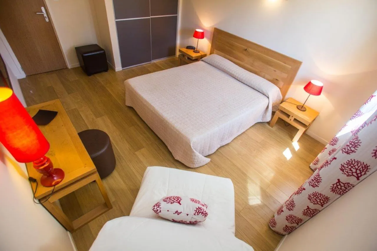 Bed in Hotel Cesario