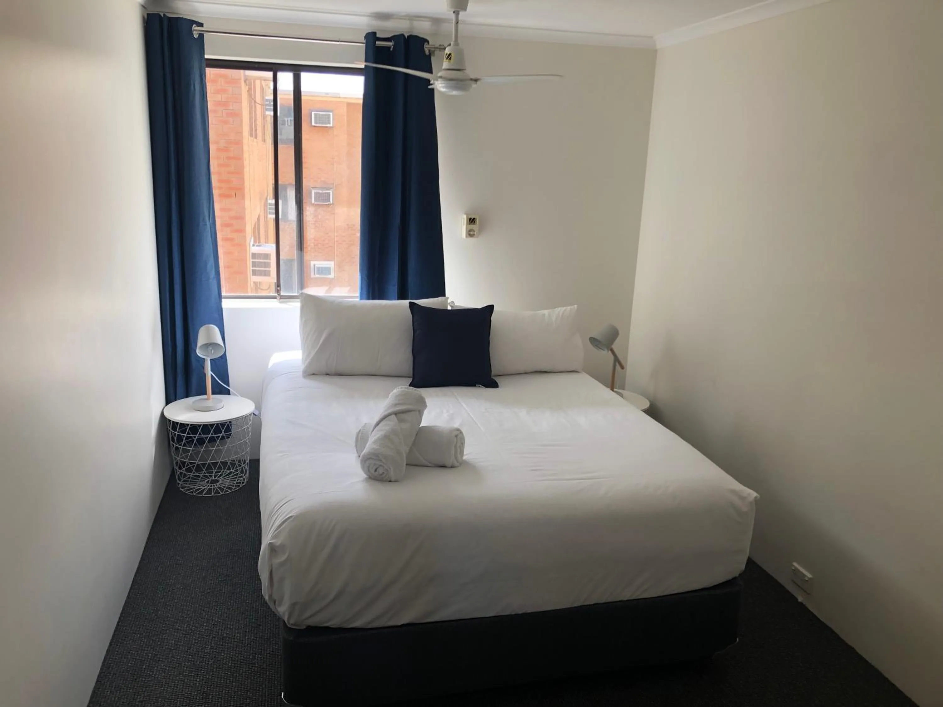 Photo of the whole room, Bed in Wheeler Apartments Perth