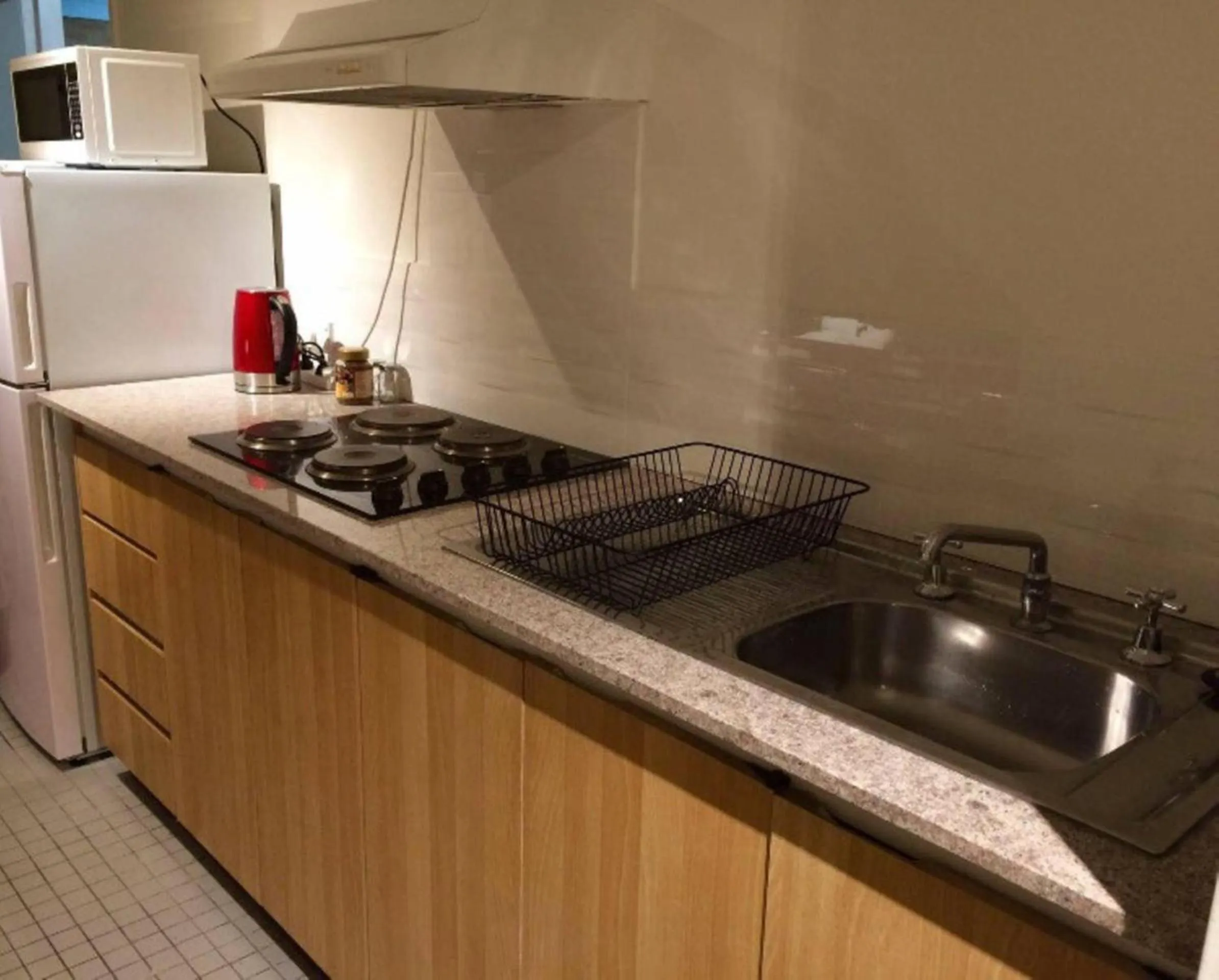 Kitchen or kitchenette in Wheeler Apartments Perth