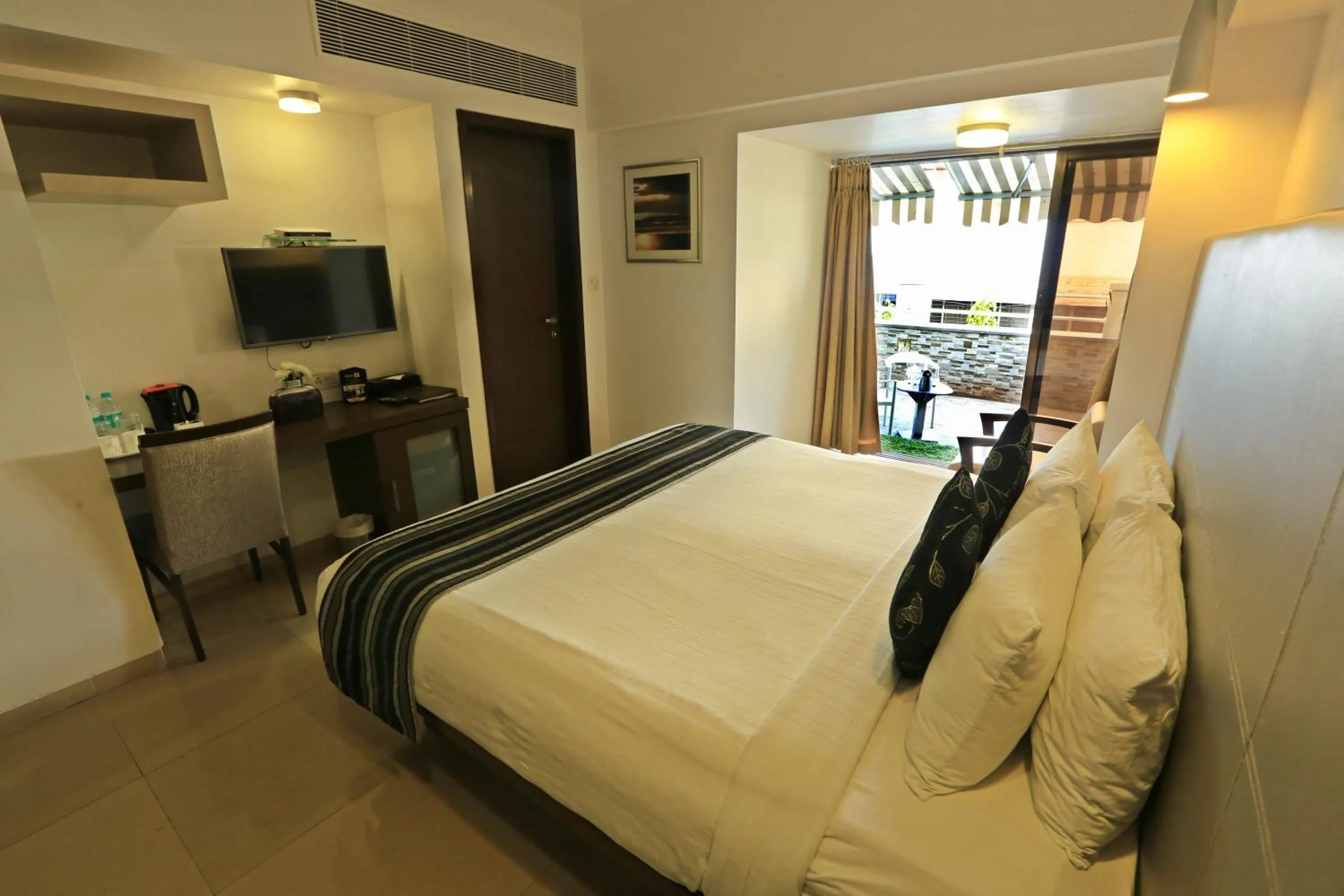 Bed in The Oriental Residency