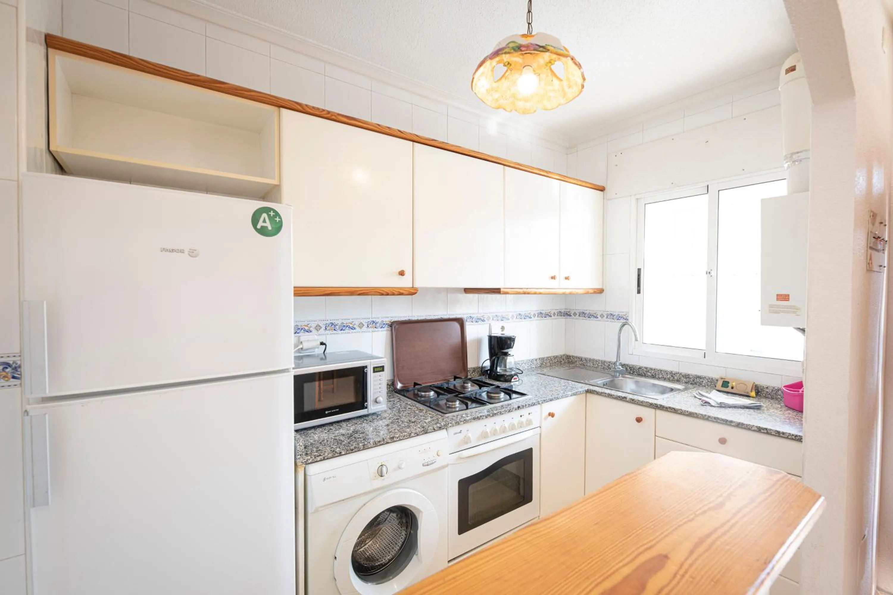 Kitchen or kitchenette in Destinos De Sol Los Alcazares - Montepío Minería