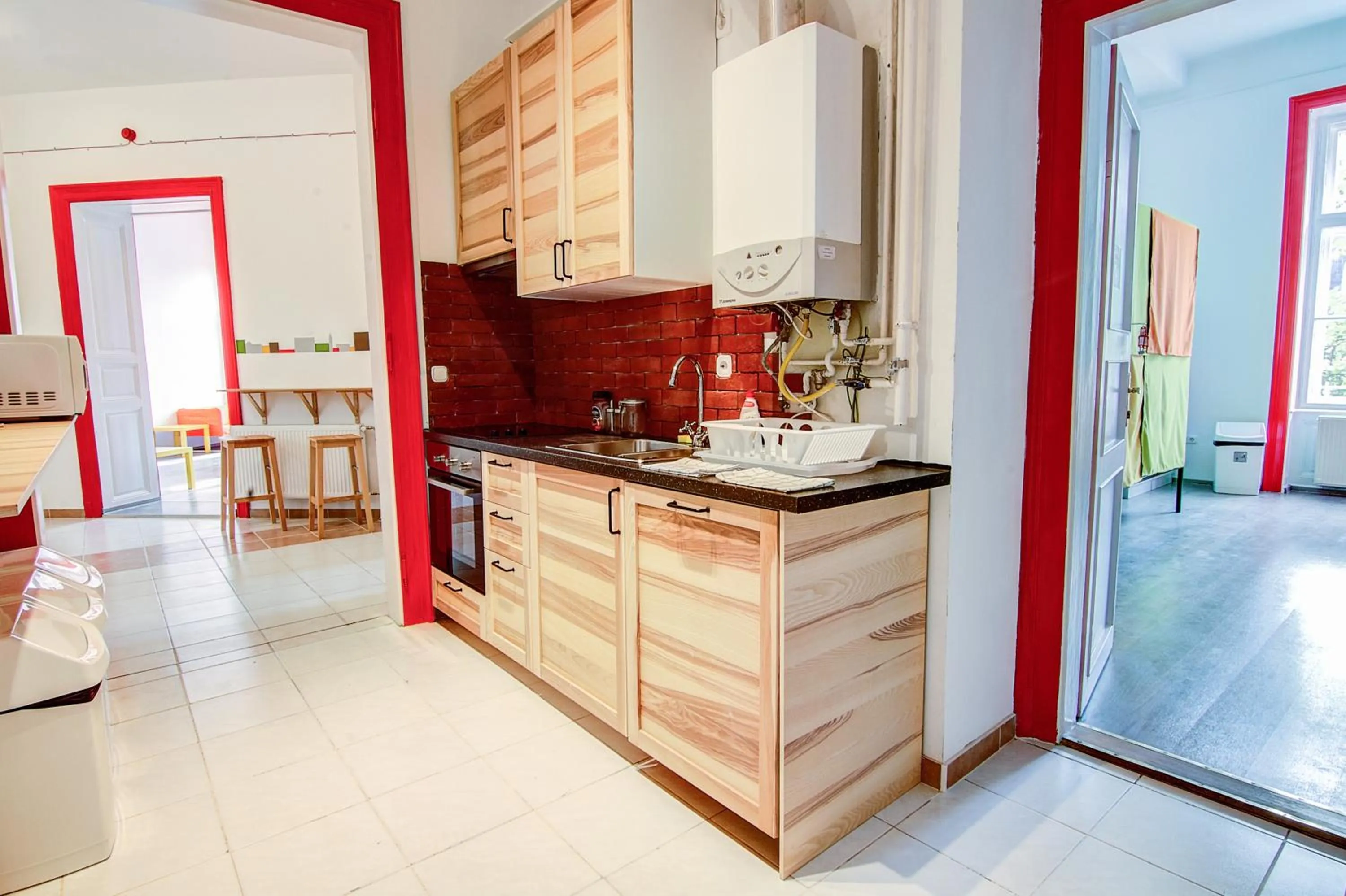 Communal kitchen in Pal's Mini Hostel