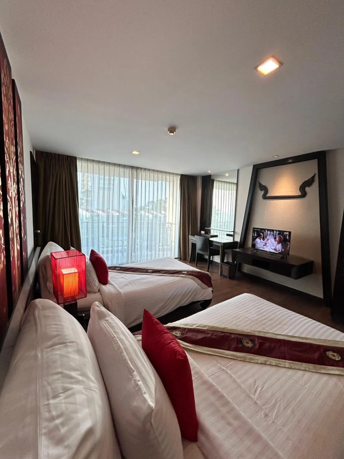 Bed in Royal Thai Pavilion Jomtien Hotel