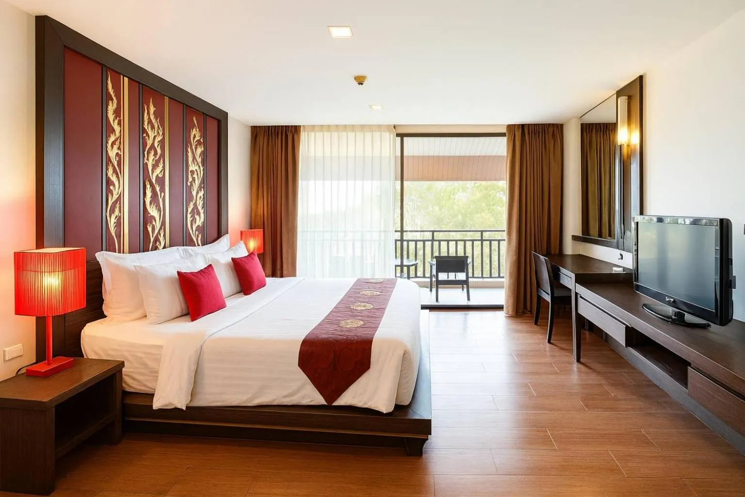 Bed in Royal Thai Pavilion Jomtien Hotel