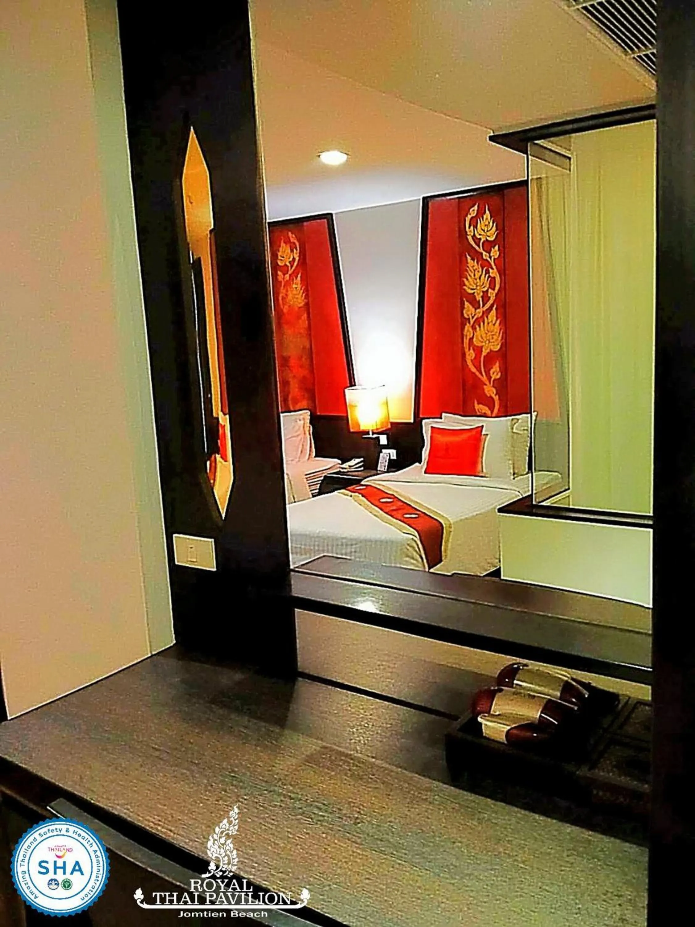 Bed in Royal Thai Pavilion Jomtien Hotel