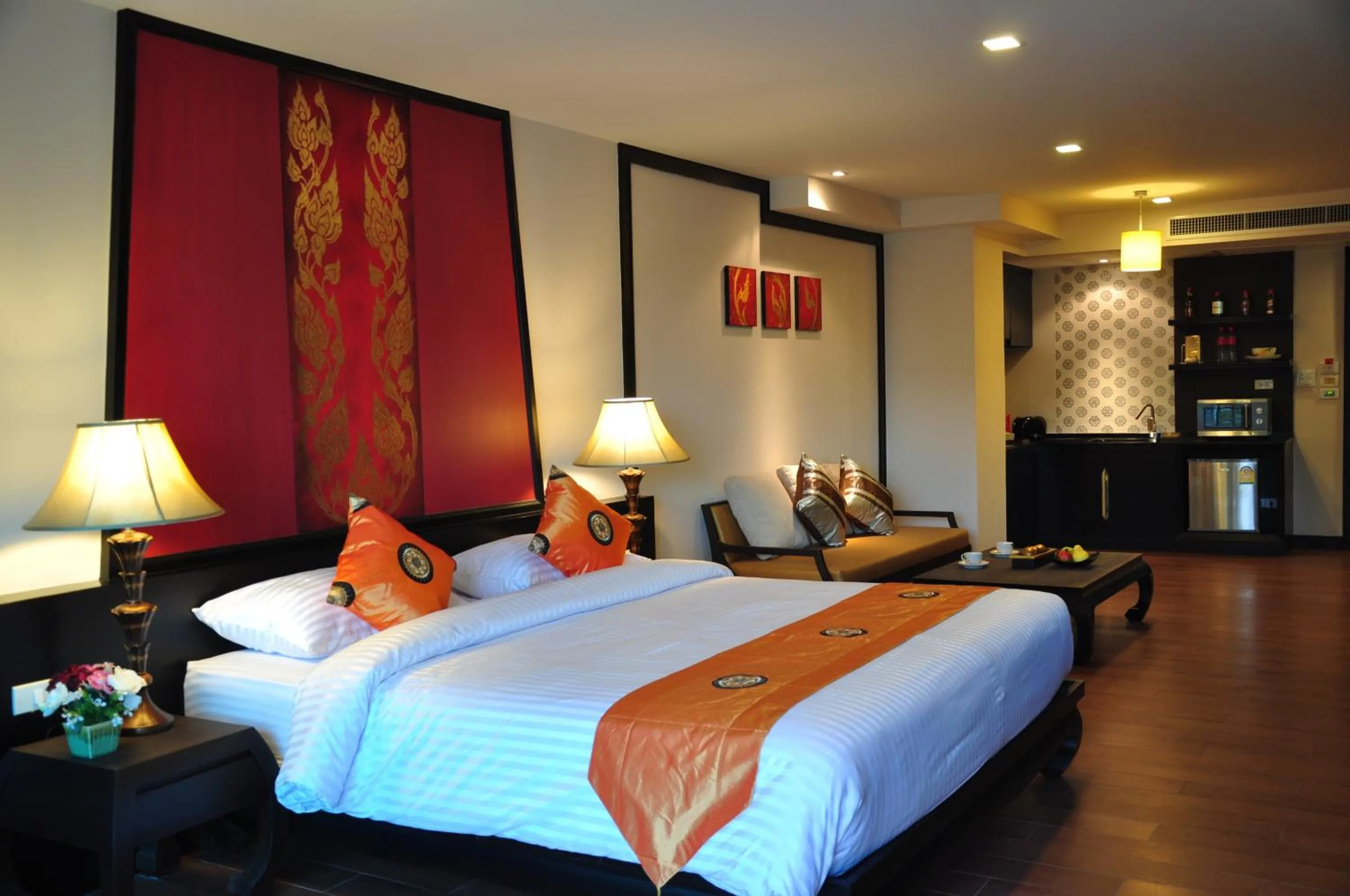 Bed in Royal Thai Pavilion Jomtien Hotel