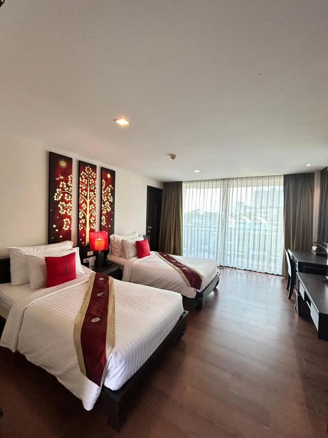 Bed in Royal Thai Pavilion Jomtien Hotel