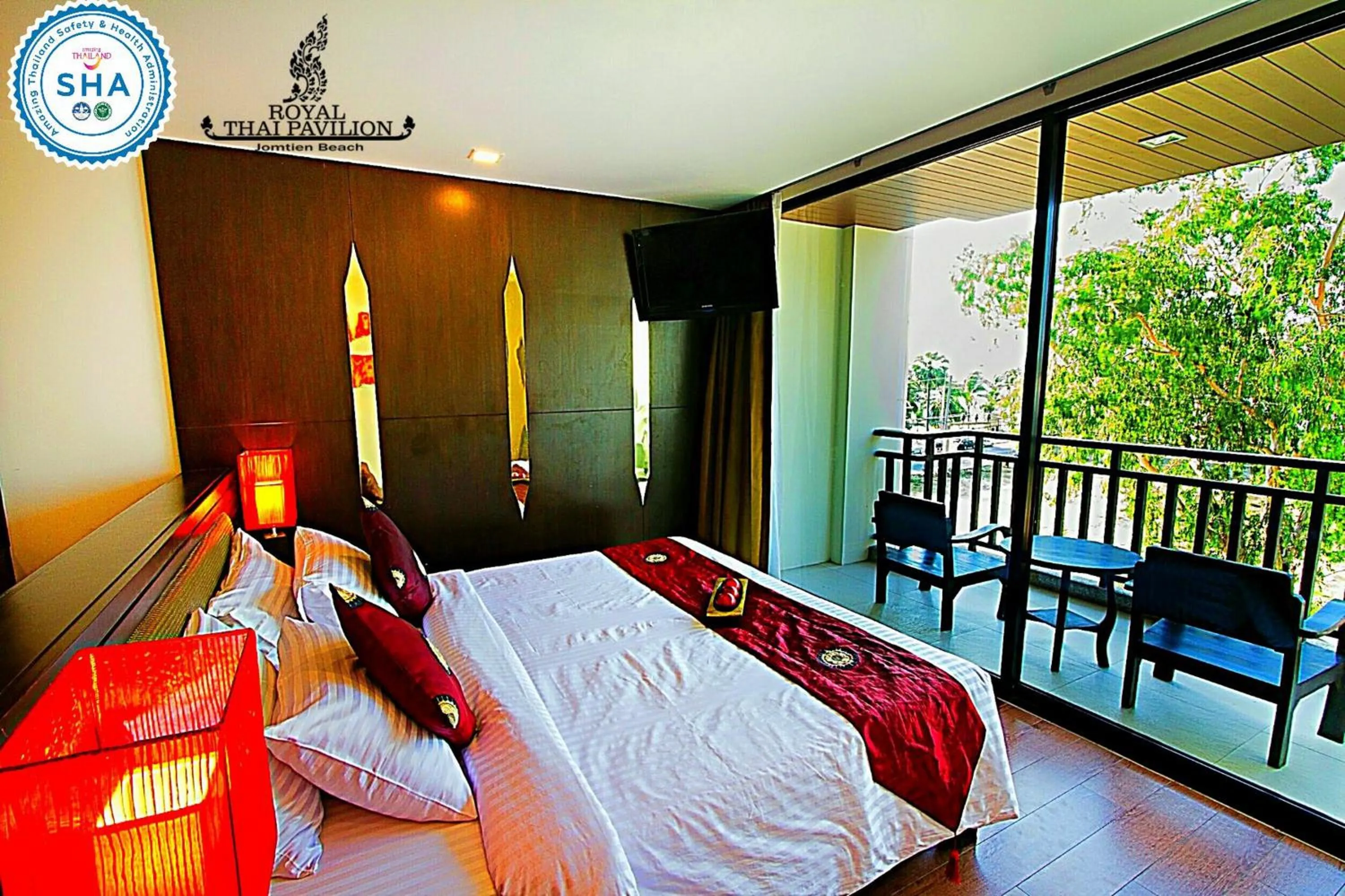 Bed in Royal Thai Pavilion Jomtien Hotel