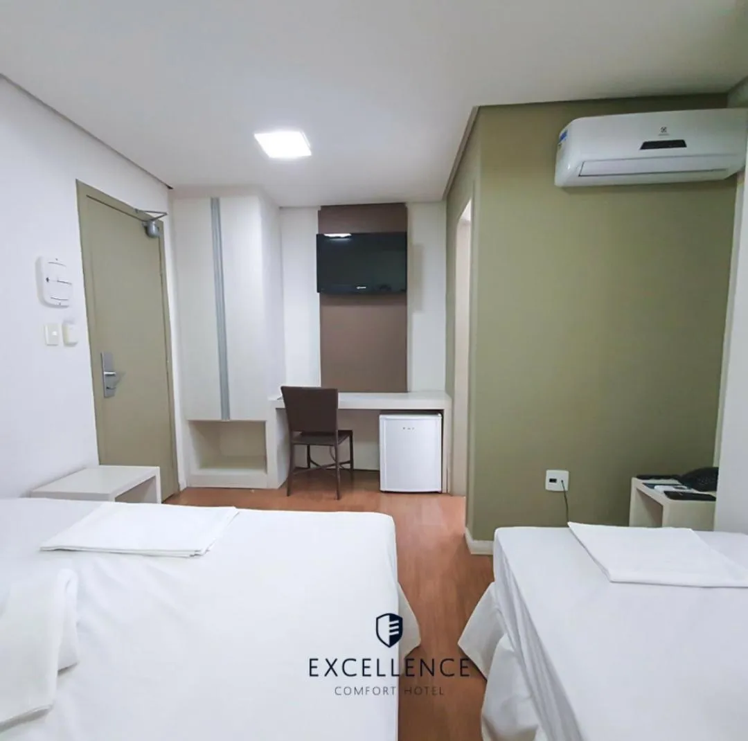 Bed in Excellence Comfort Hotel