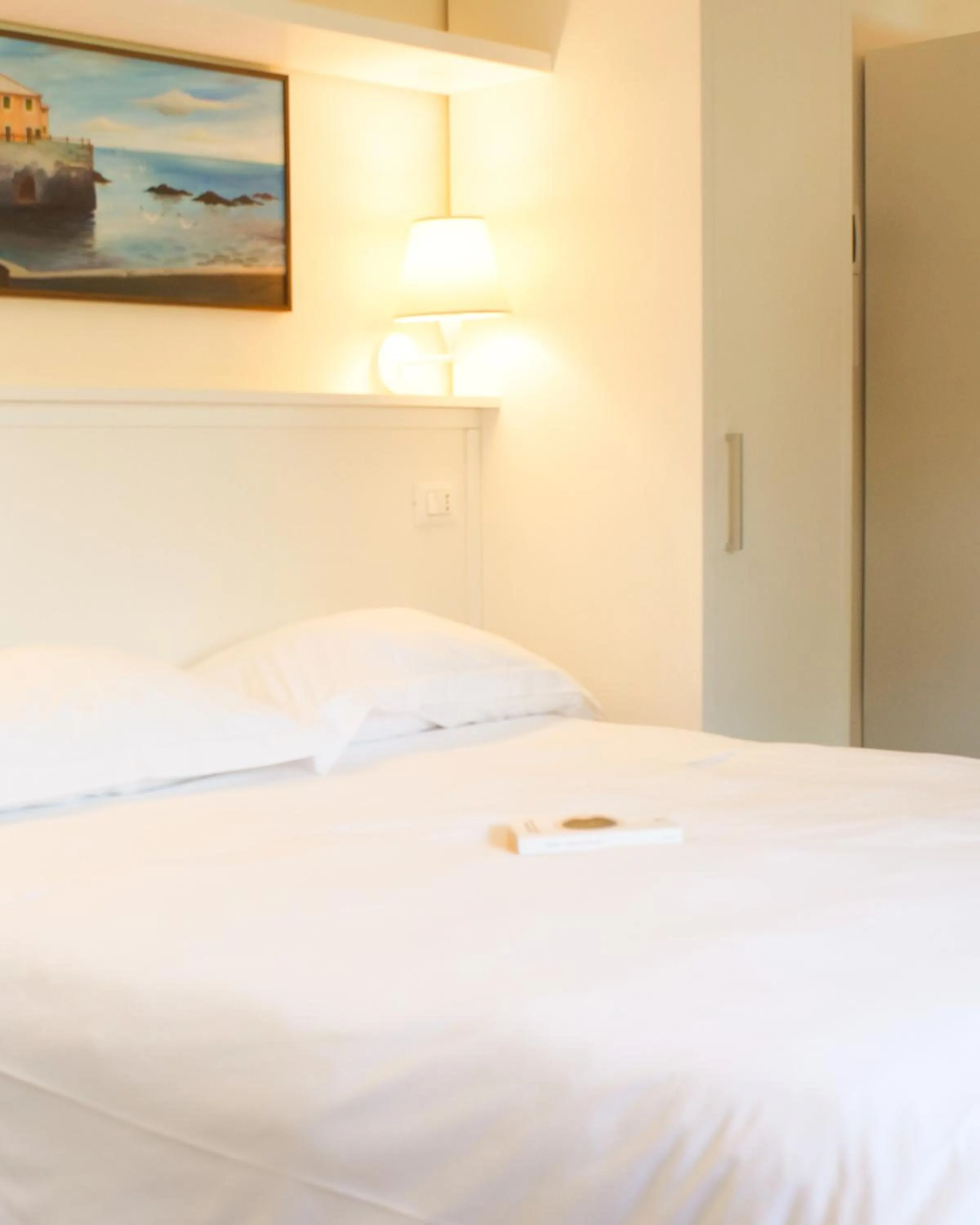 Bed in Rex Hotel Residence