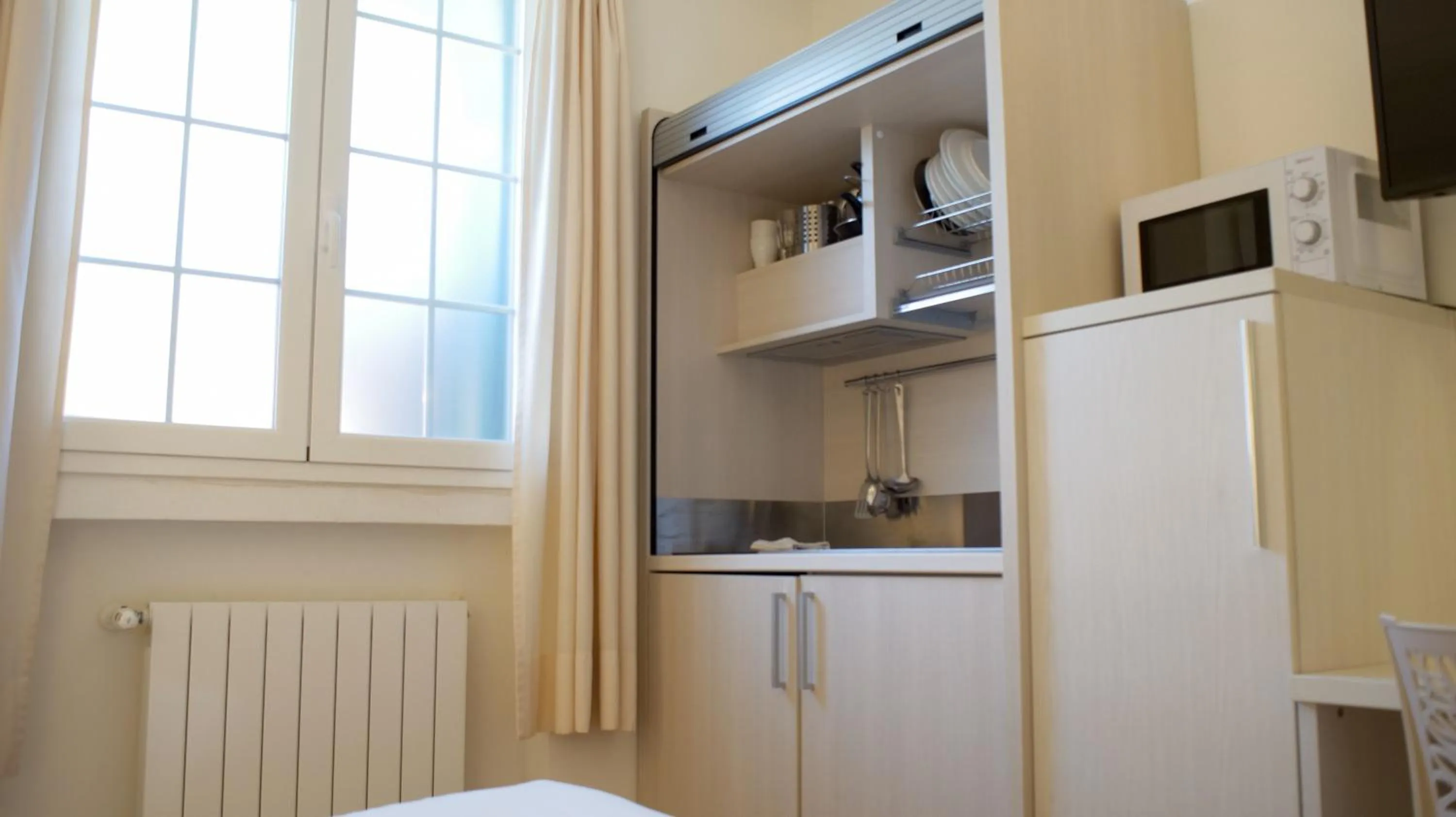 kitchen in Rex Hotel Residence