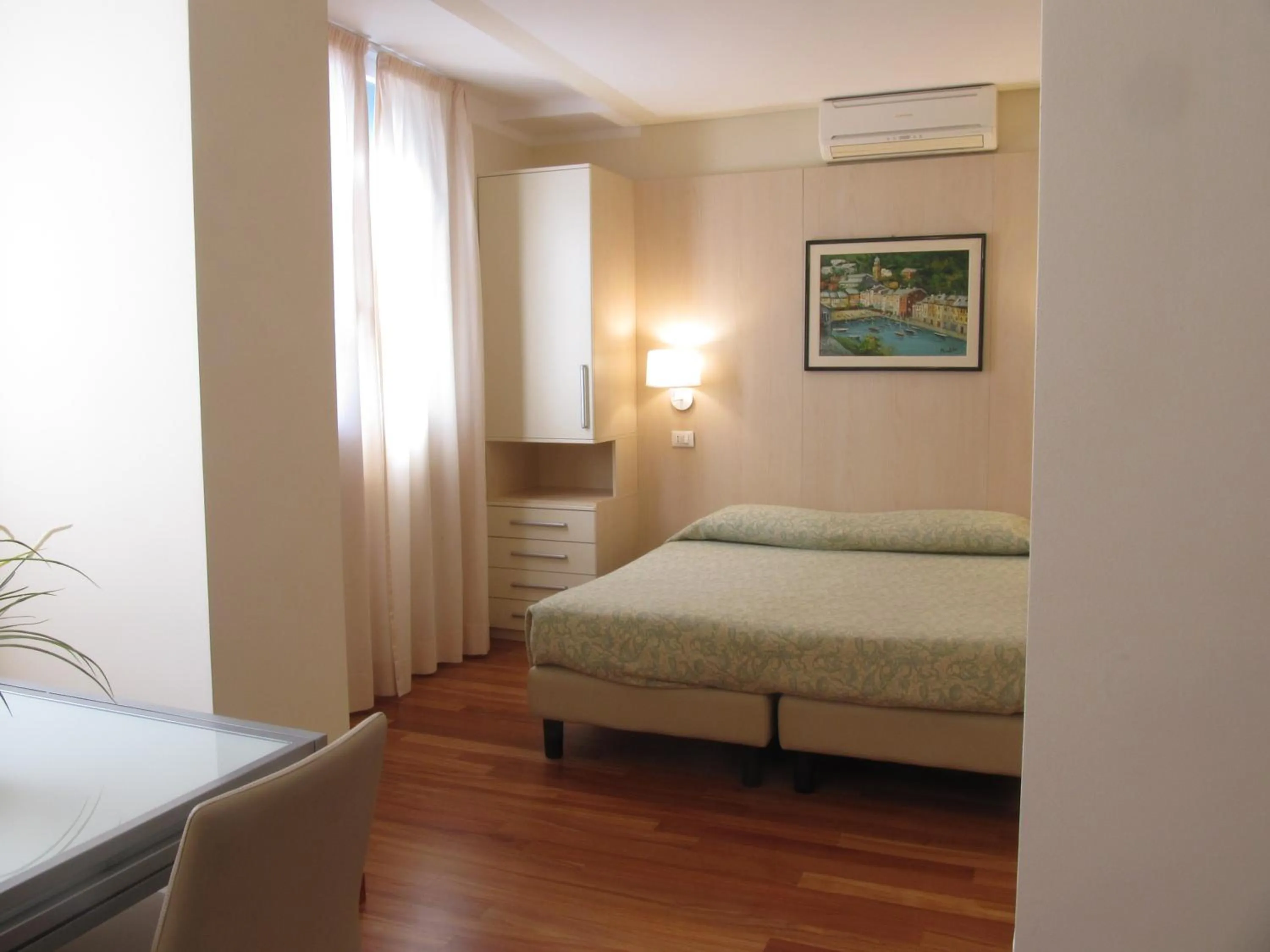 Photo of the whole room, Bed in Rex Hotel Residence