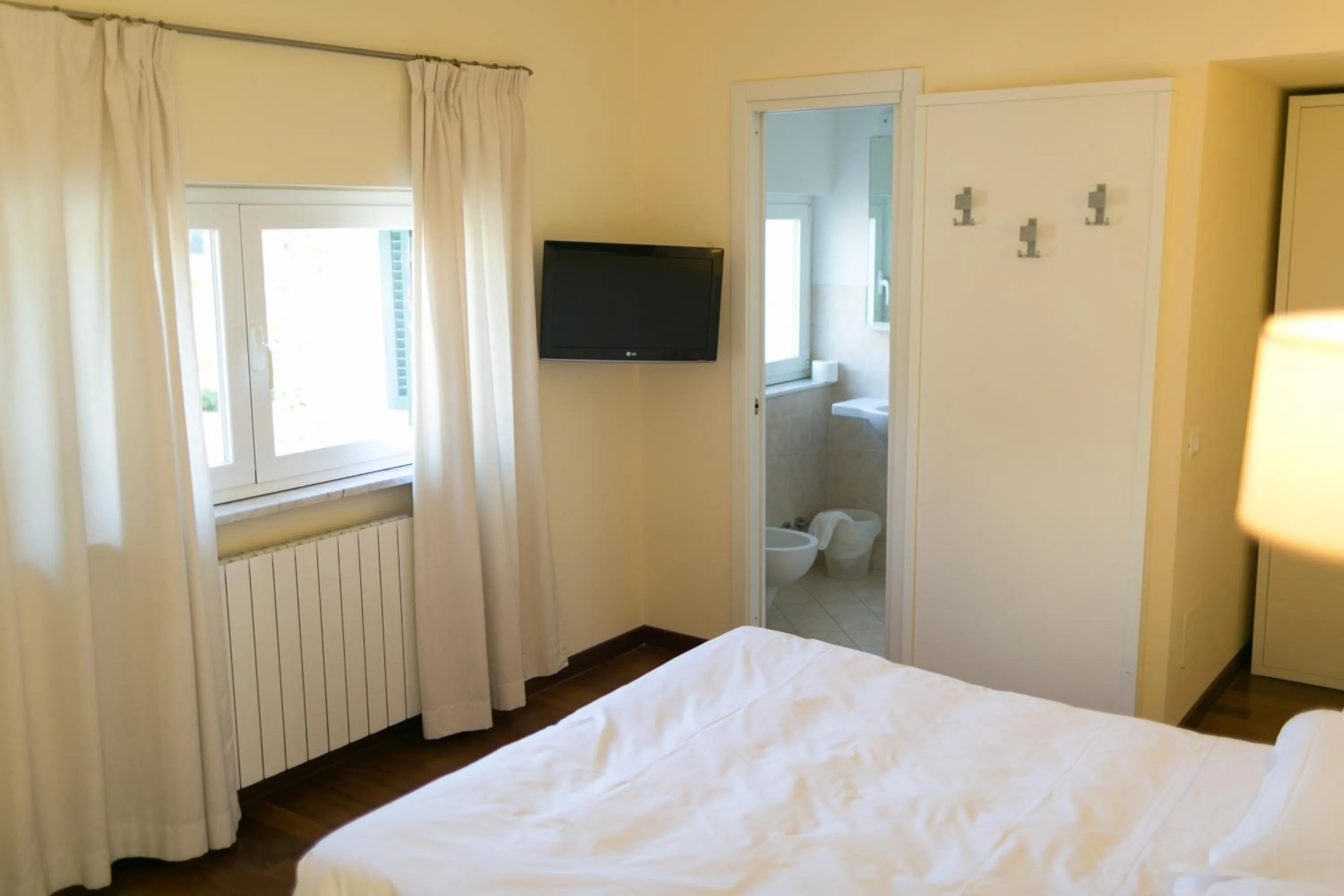 Bed in Rex Hotel Residence