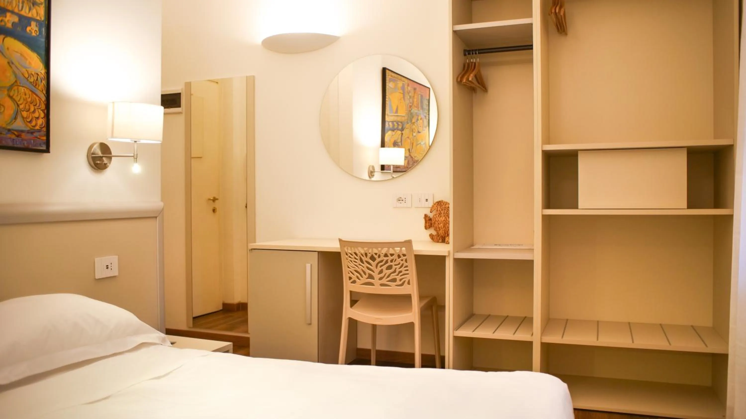 Bed in Rex Hotel Residence