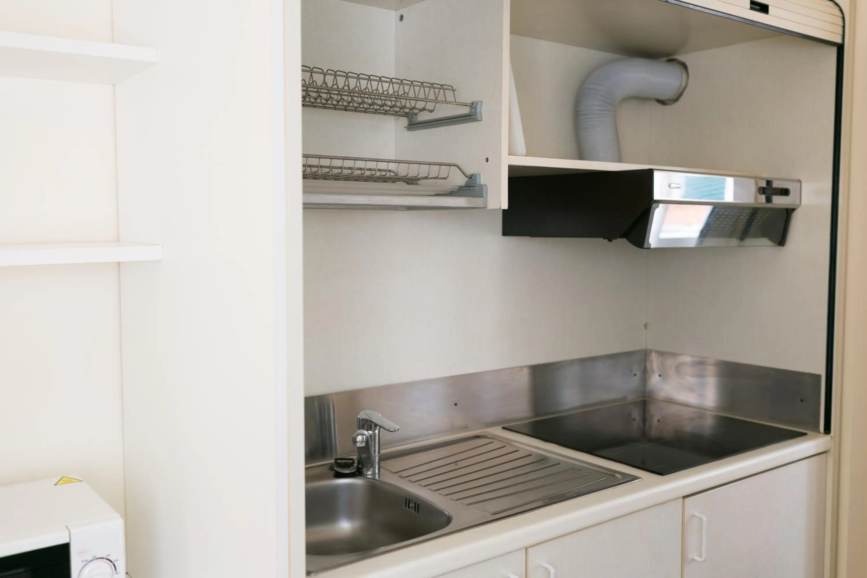 Kitchen or kitchenette in Rex Hotel Residence